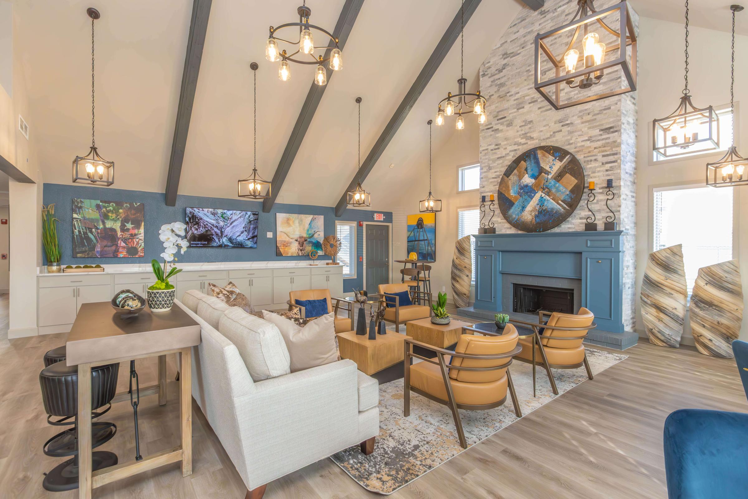 a living room filled with furniture and a fireplace