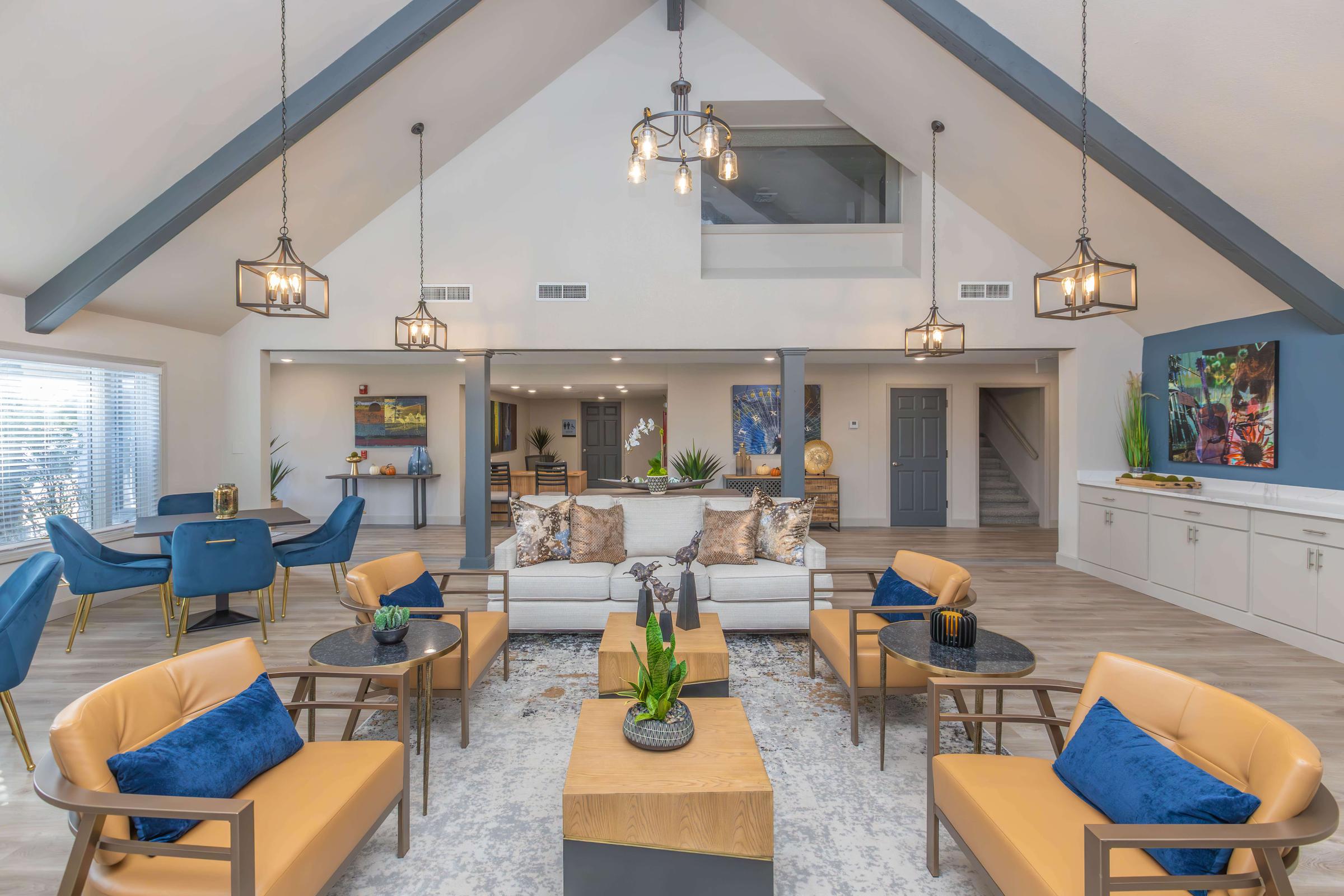 a living room filled with furniture and a fireplace