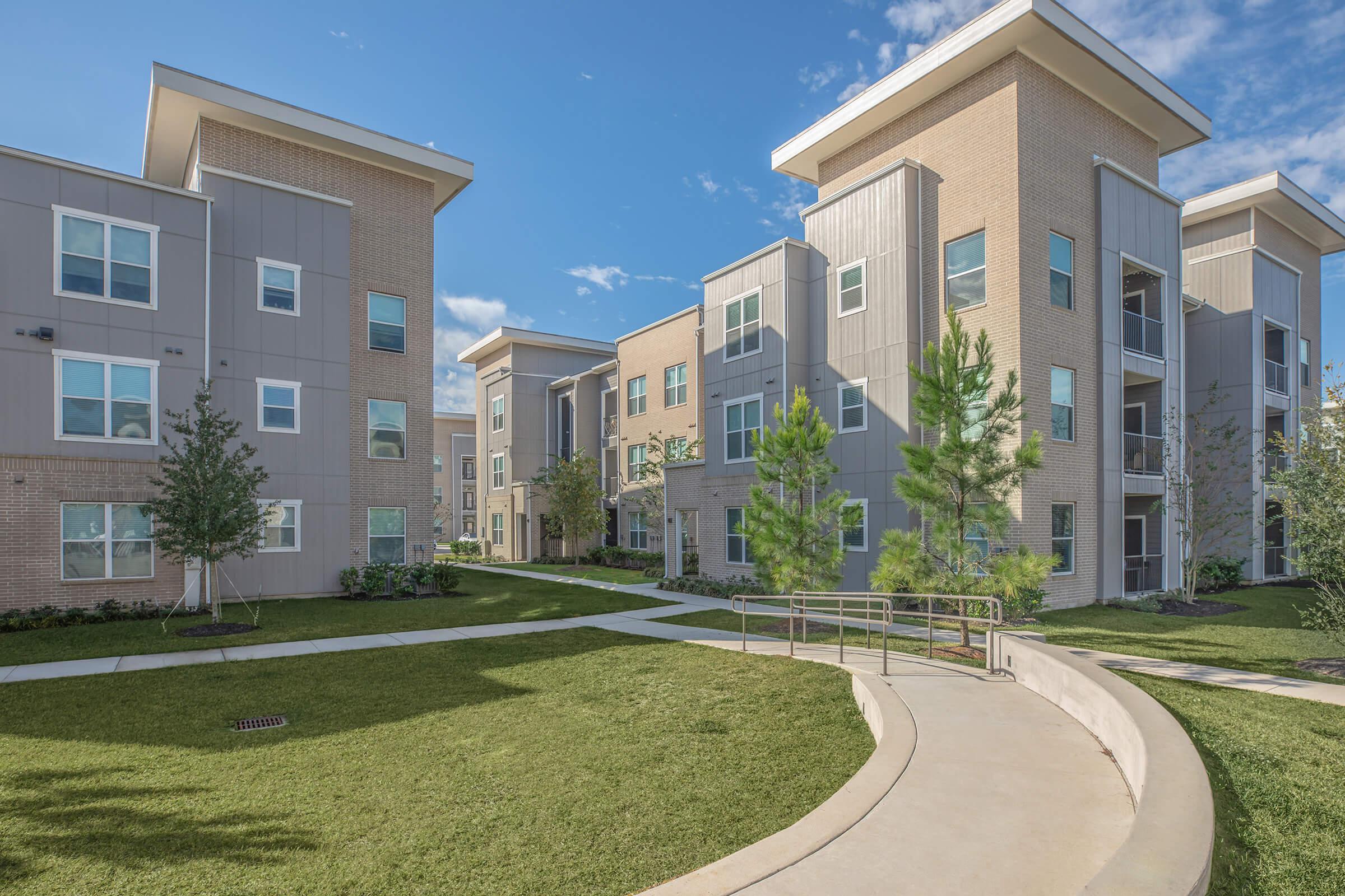 a large lawn in front of a building