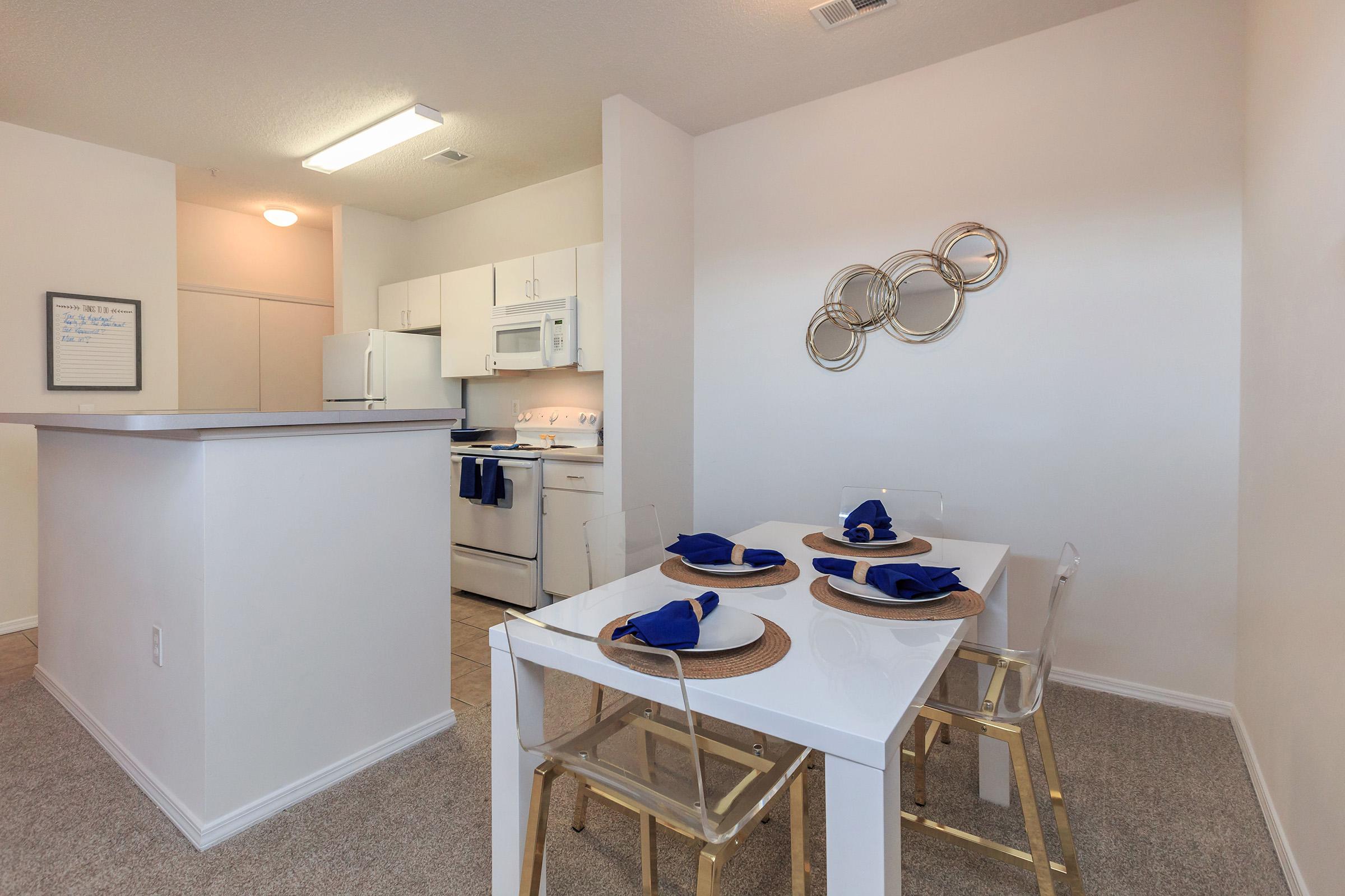 a kitchen with a stove top oven sitting inside of a refrigerator