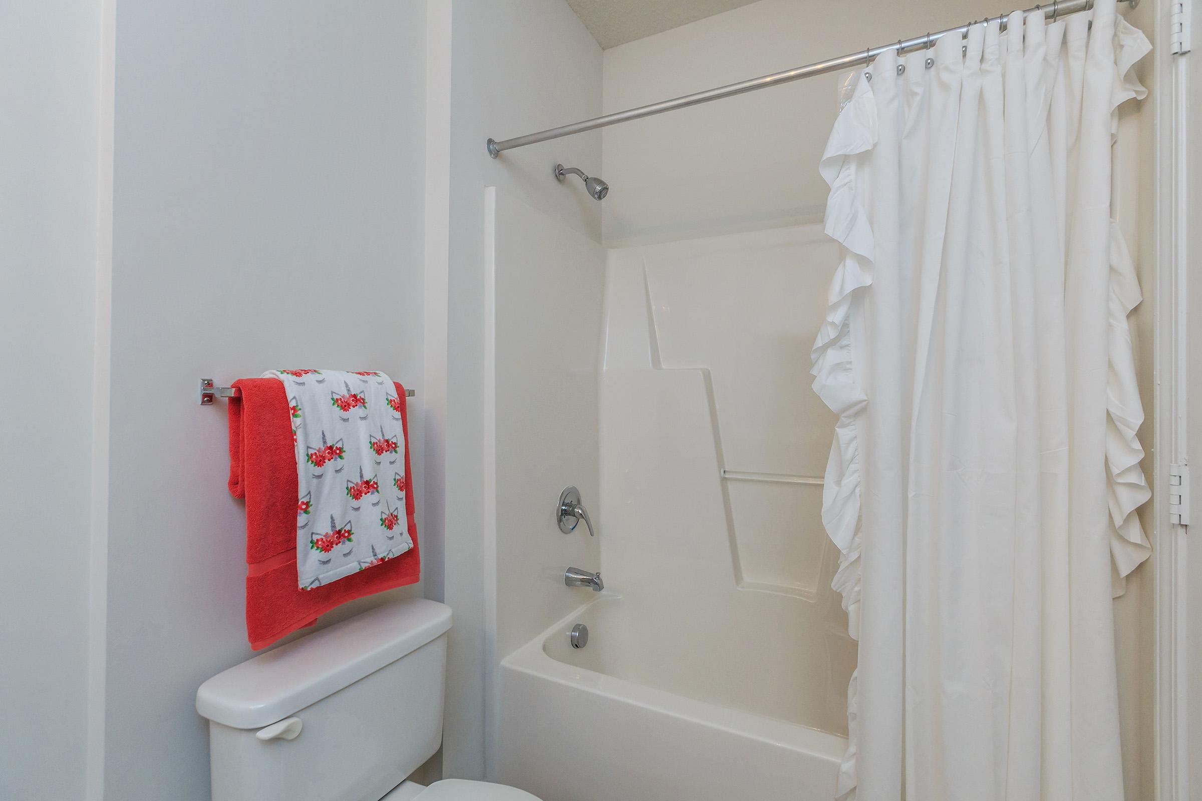 a red and white shower curtain