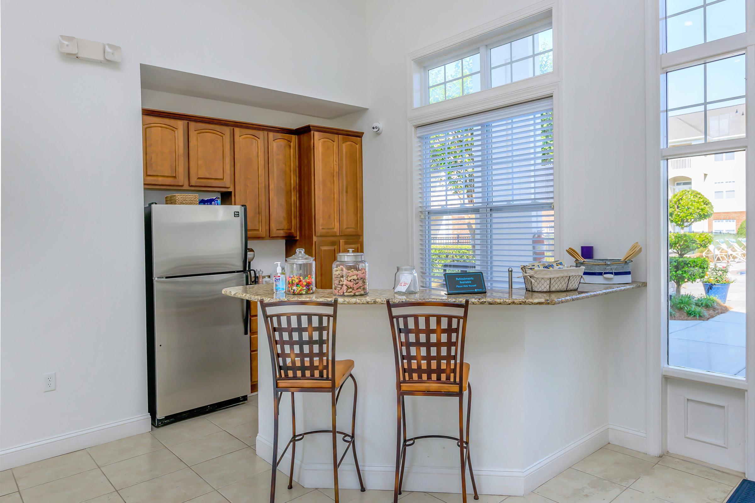 a kitchen with a window in a room