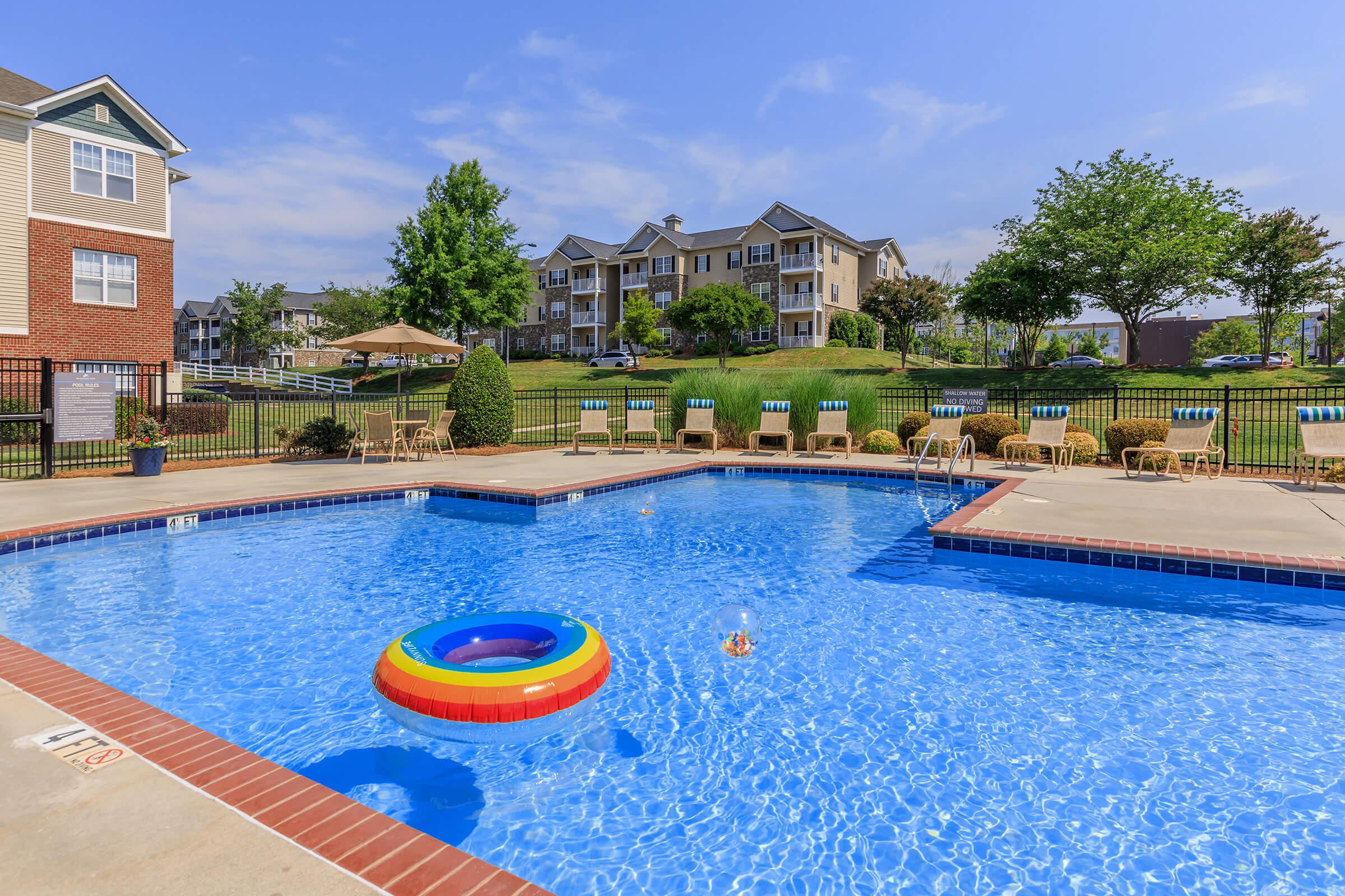 a pool next to a body of water