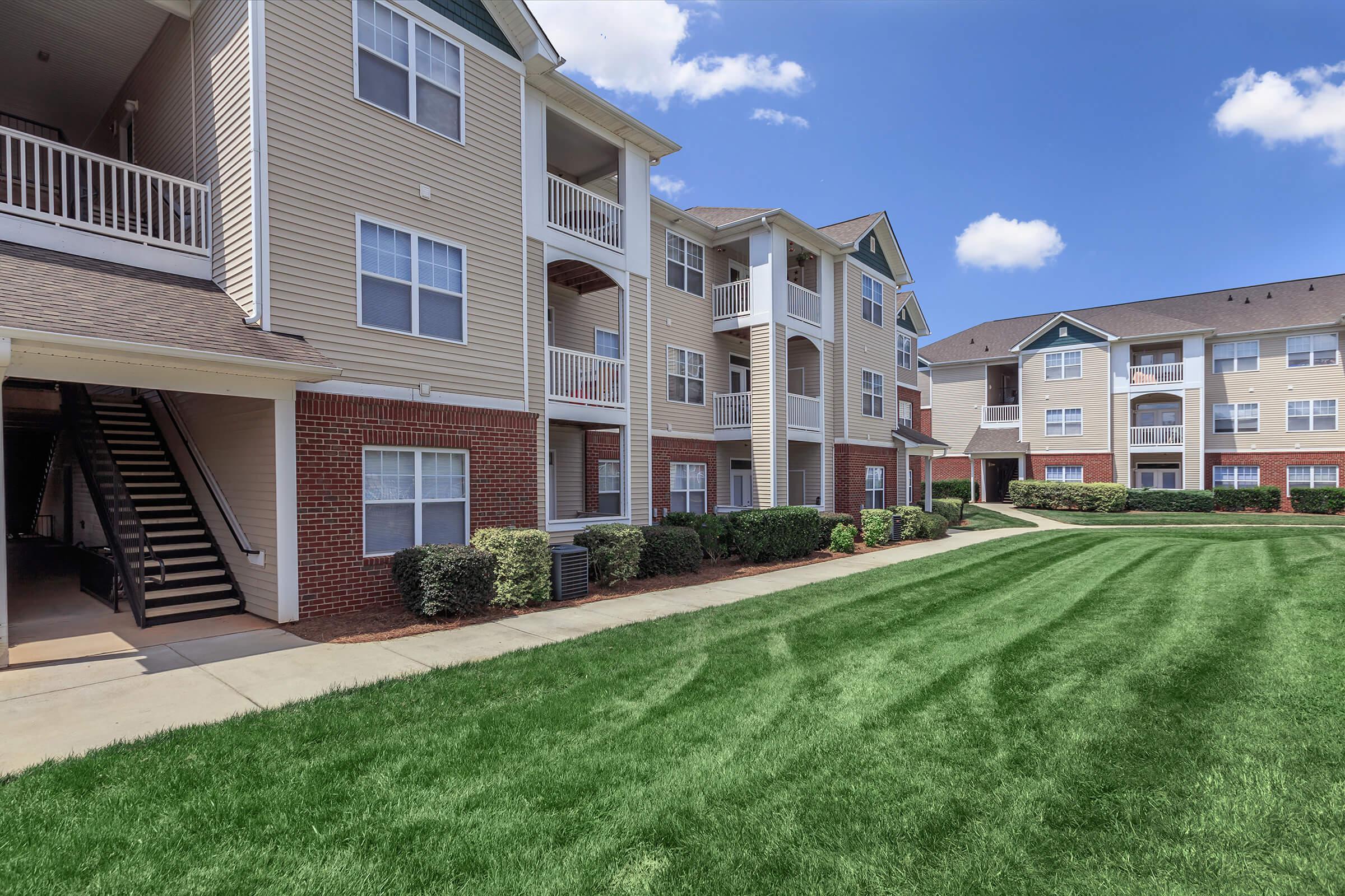 a large lawn in front of a building