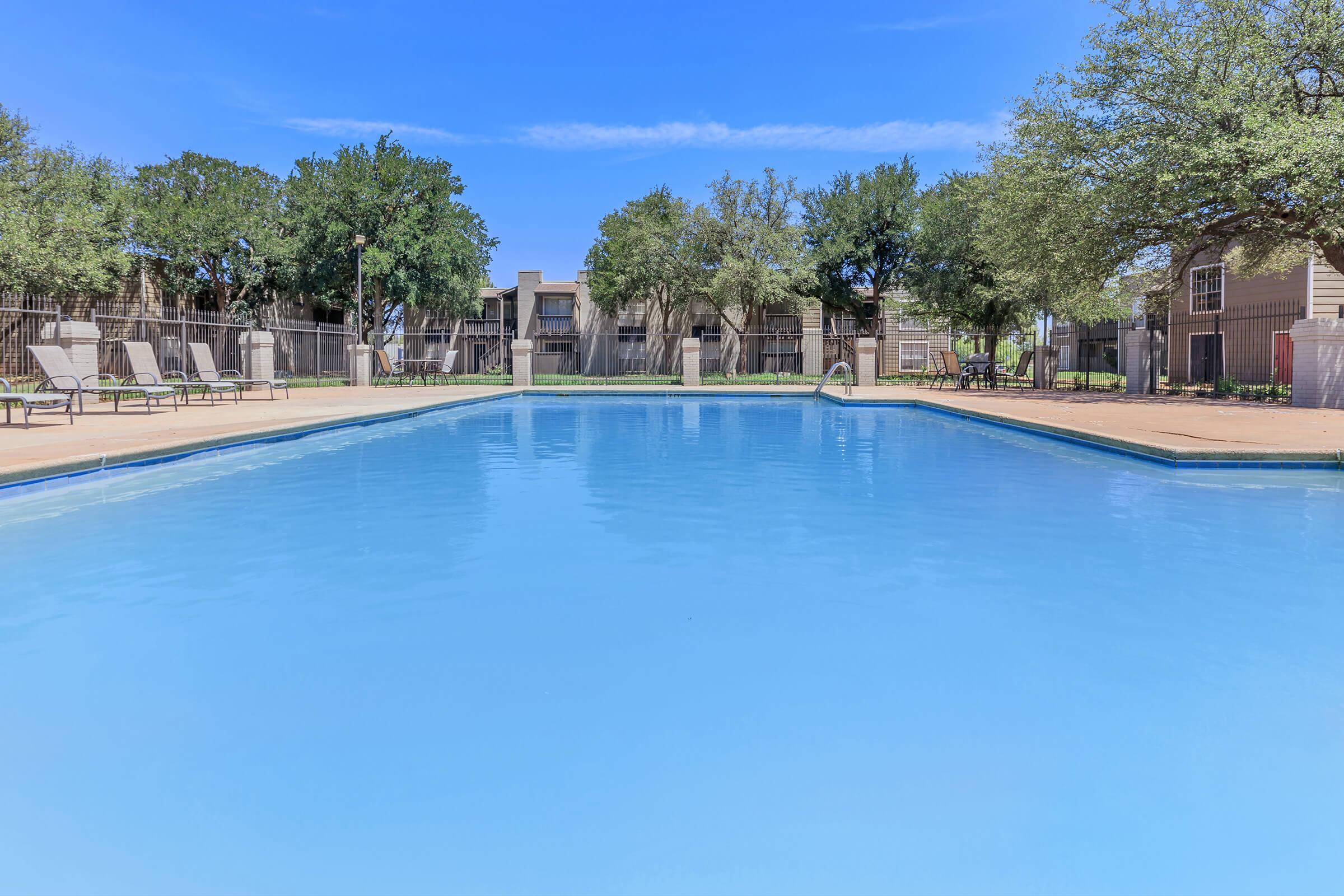 a pool next to a body of water