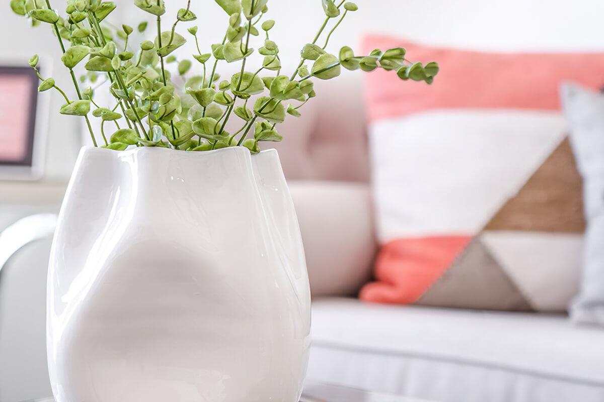 a vase filled with purple flowers