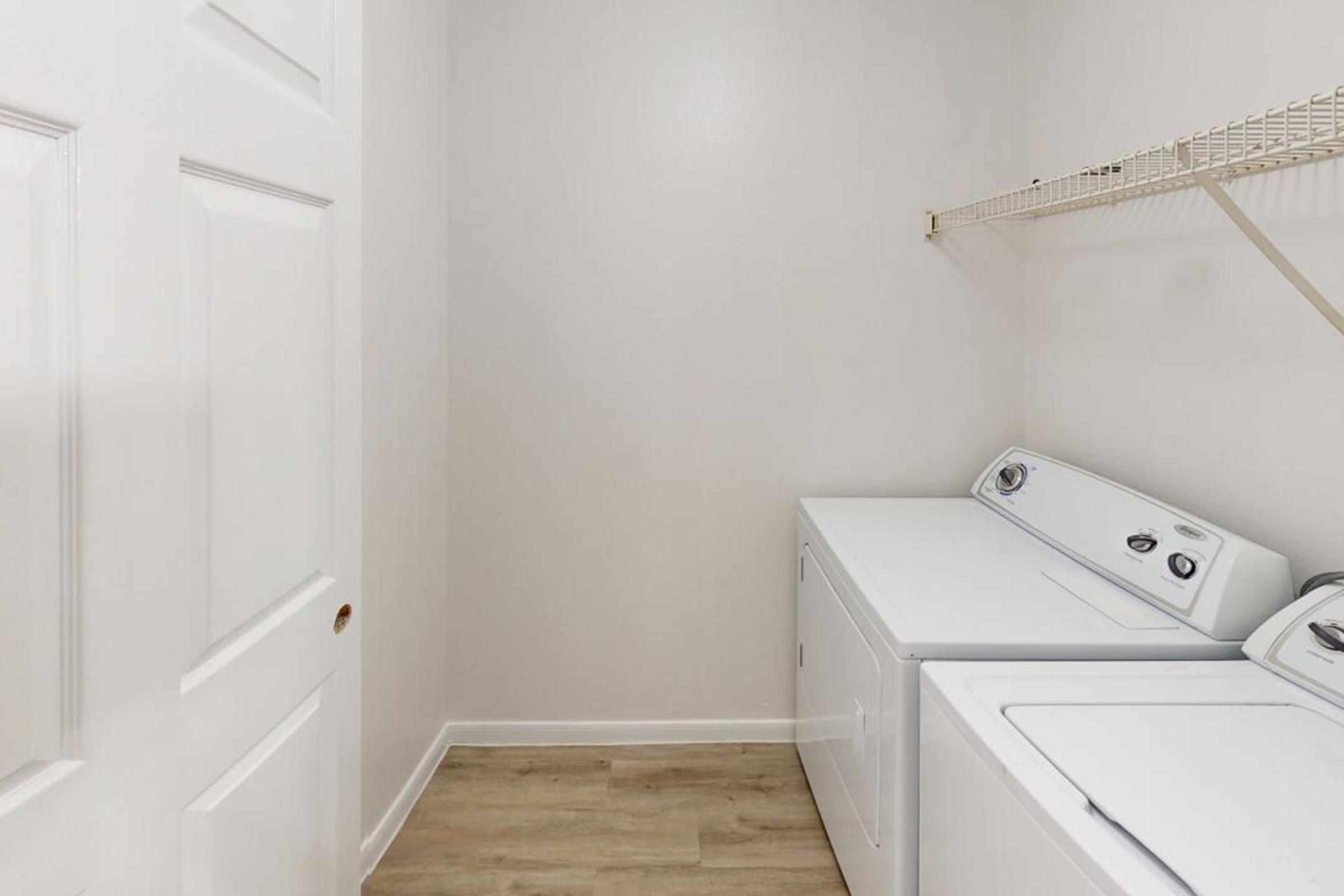 a kitchen with a stove and a sink