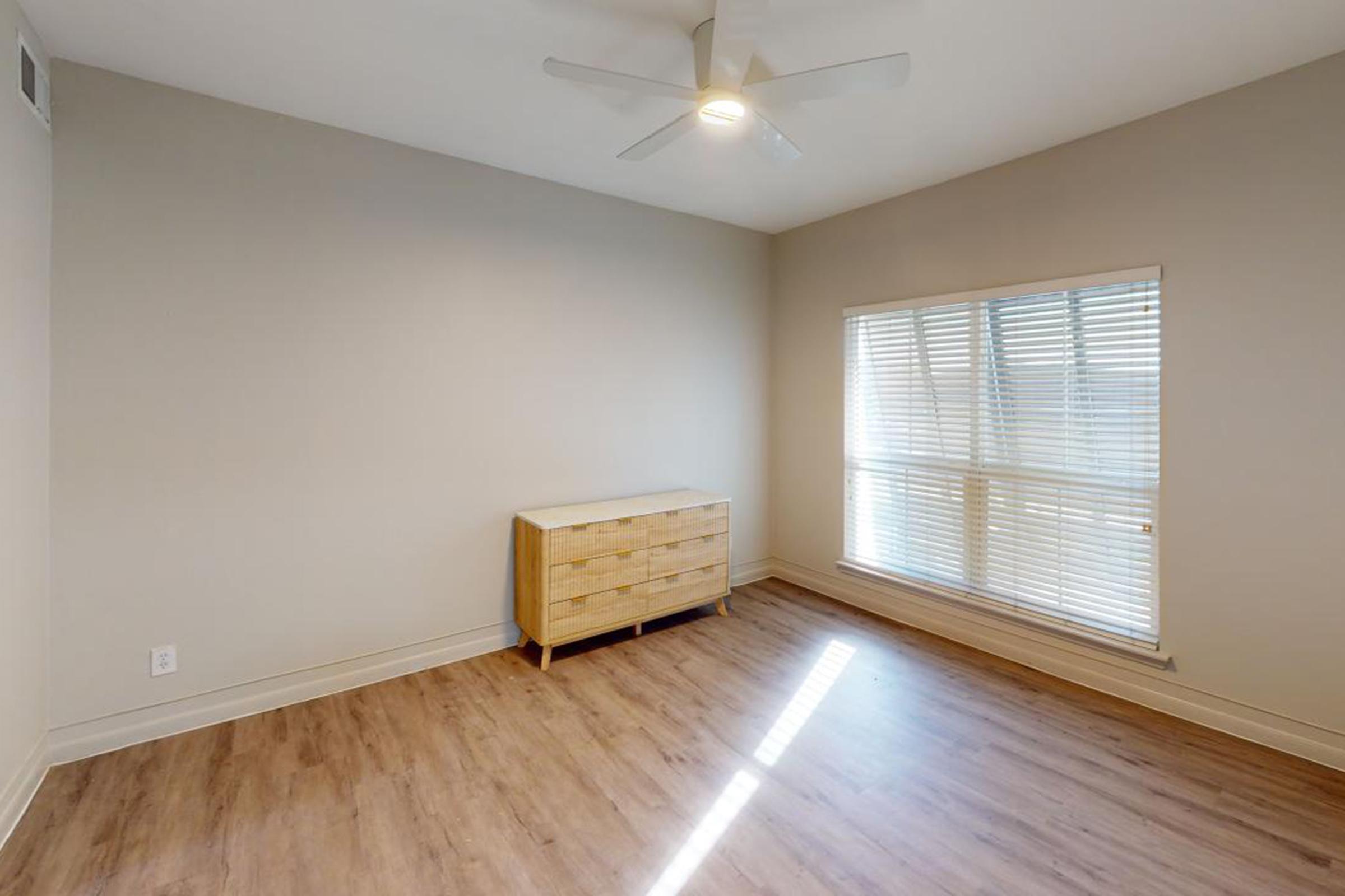 a living room with a wood floor