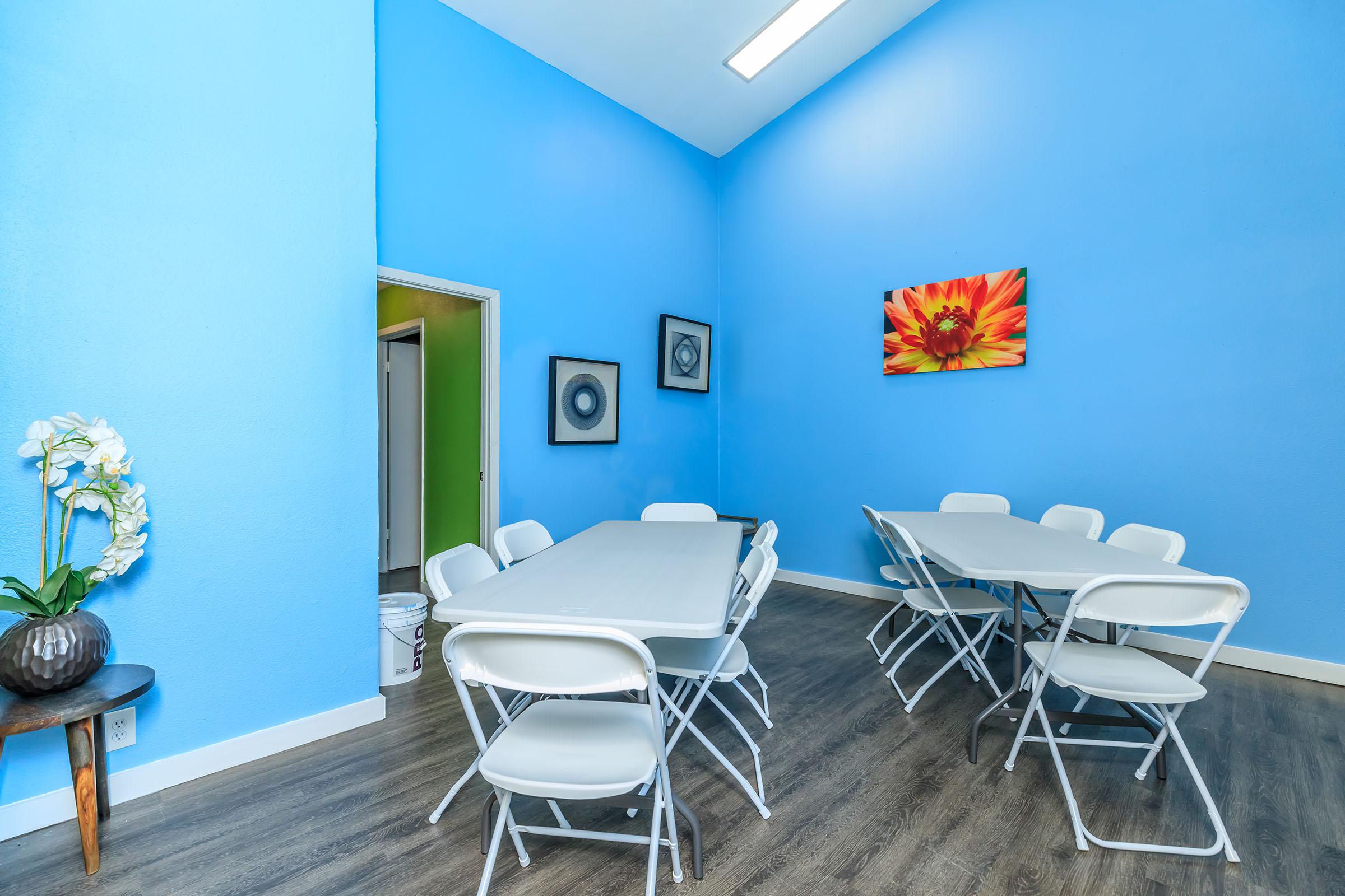 a blue chair in a room