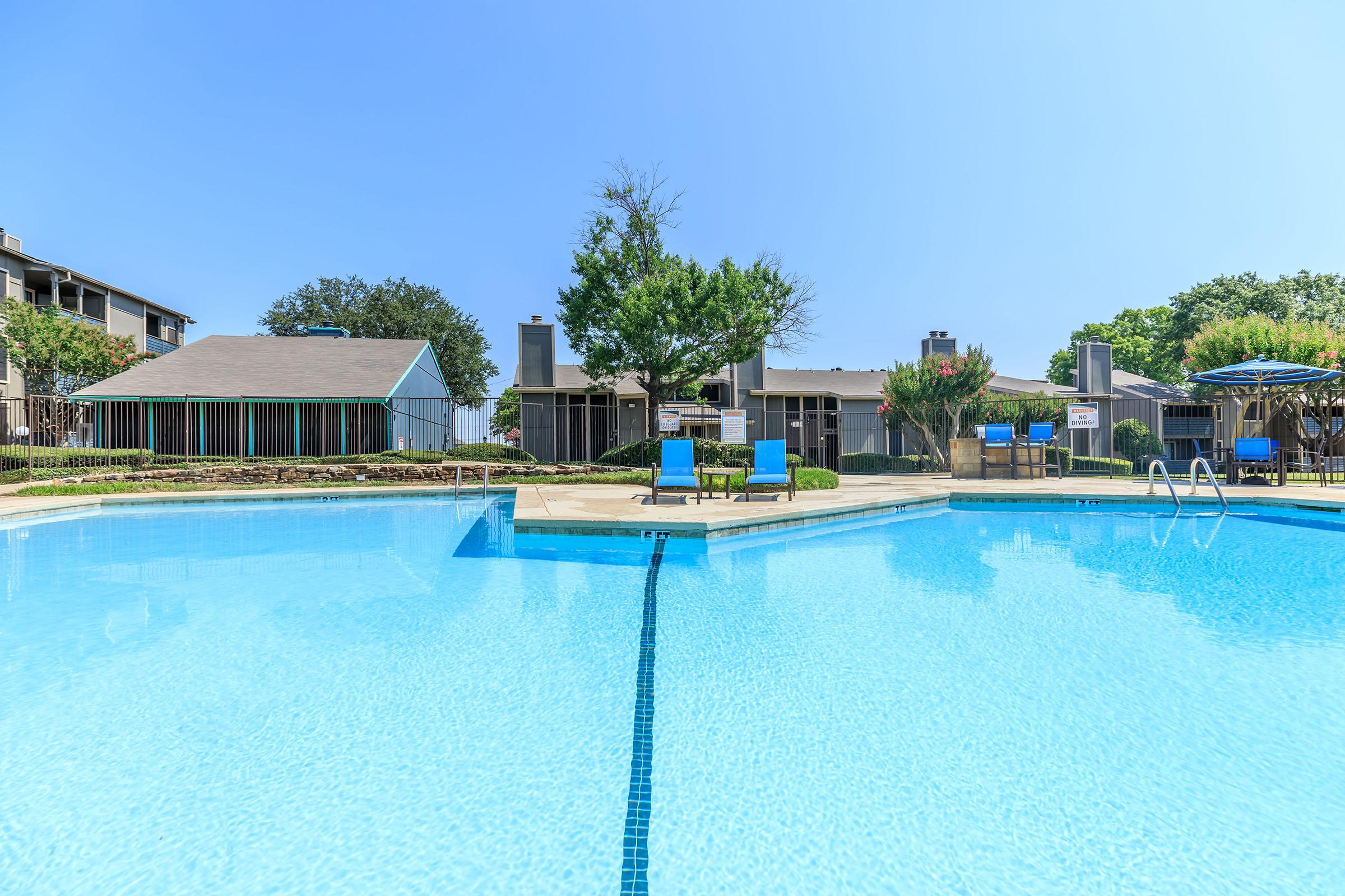 a pool next to a body of water