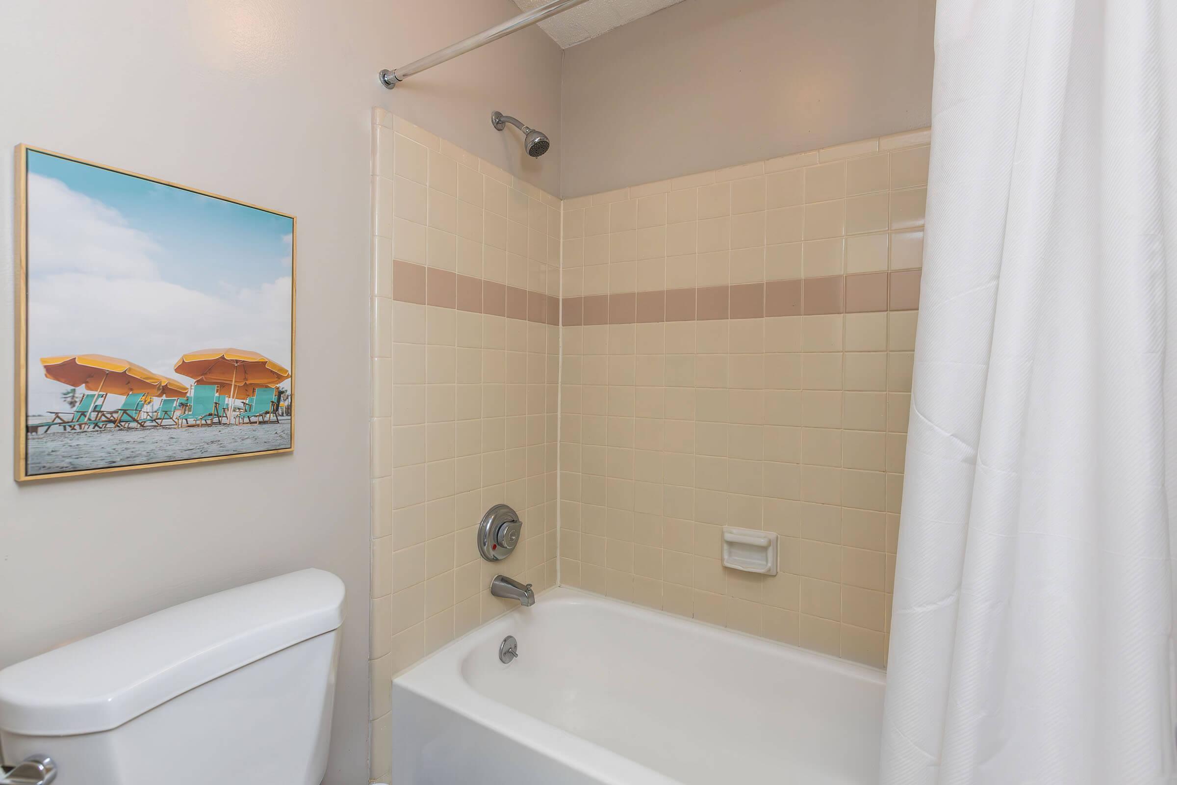 a room with a sink and a bath tub