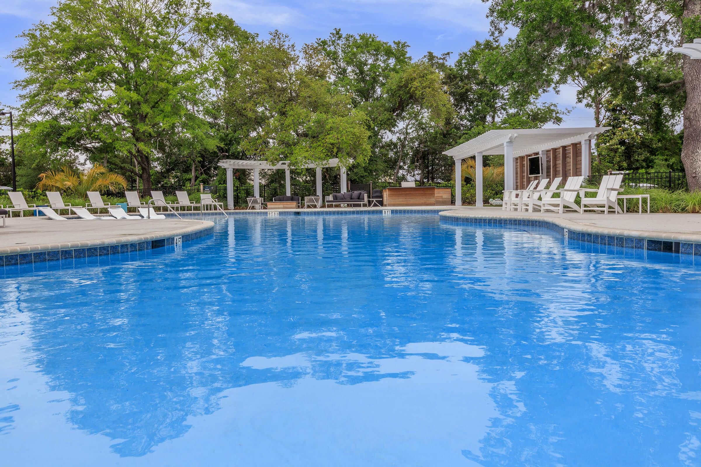 a house with a large pool of water