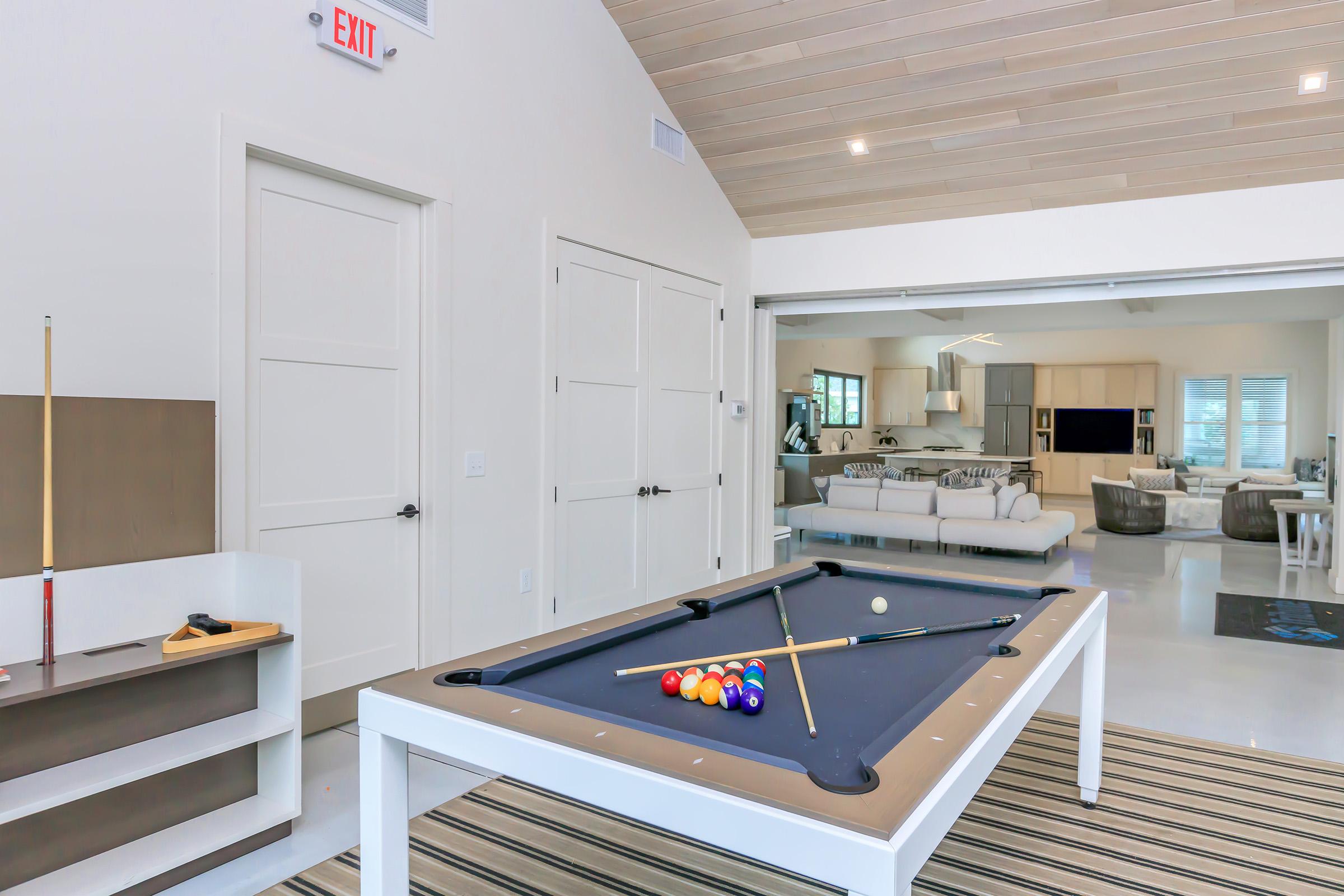 a kitchen with a table in a room