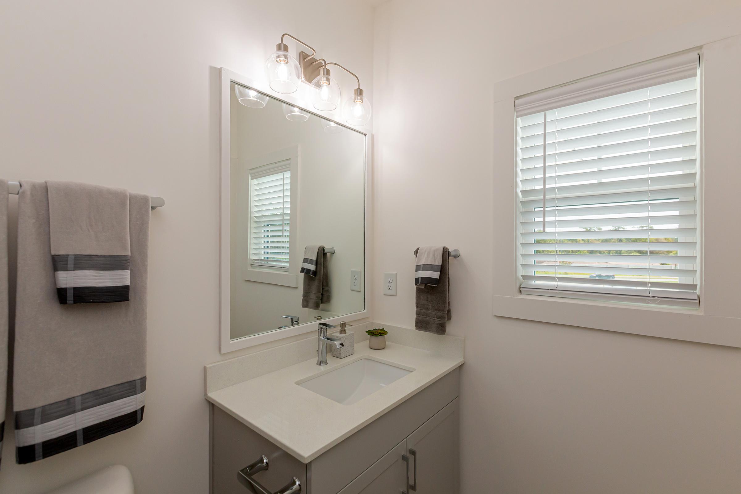 CHROME FIXTURES AND 2-INCH BLINDS