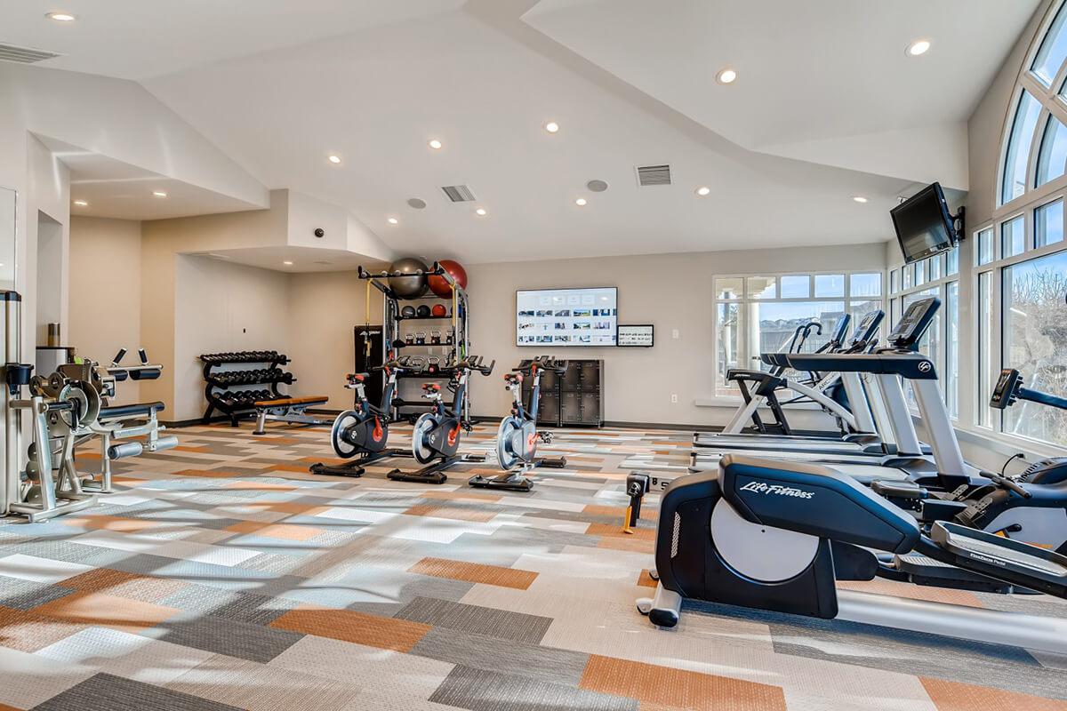 a room filled with furniture and a motorcycle