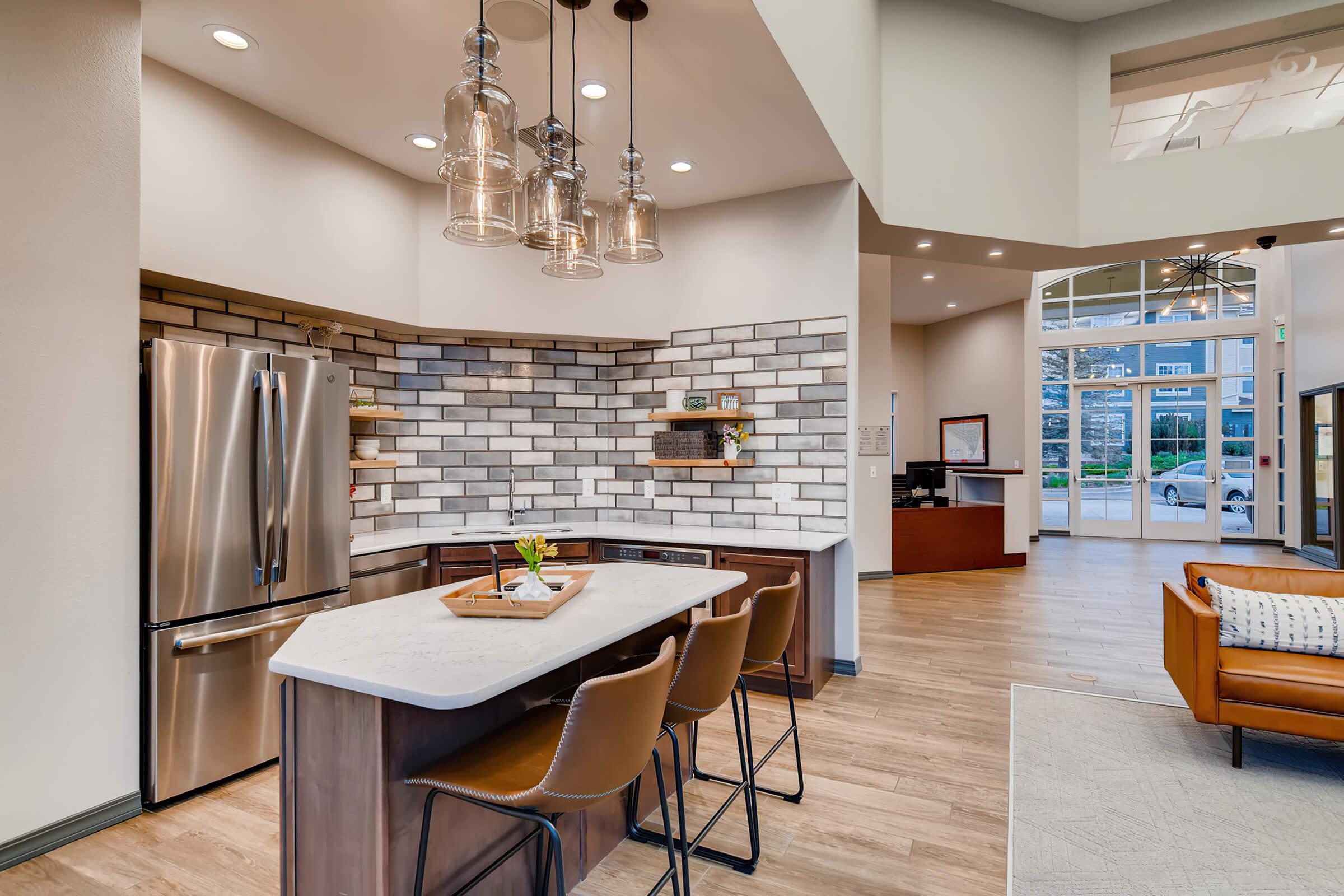 a kitchen with a dining room table