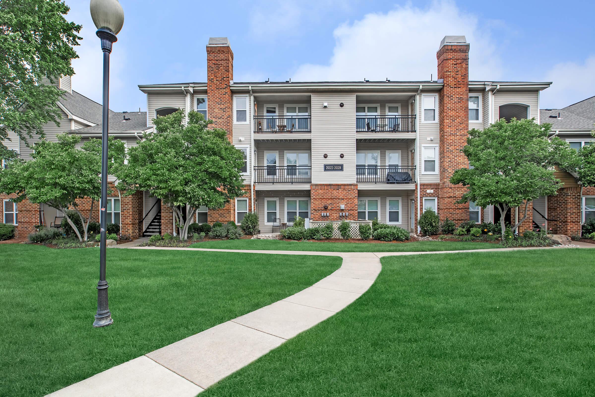 a large lawn in front of a building