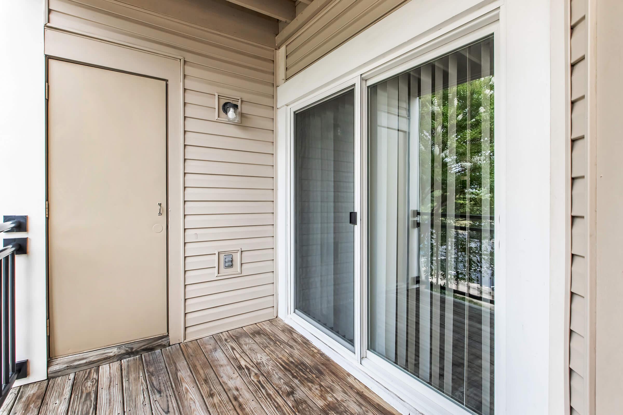 a close up of a doorway in front of a window