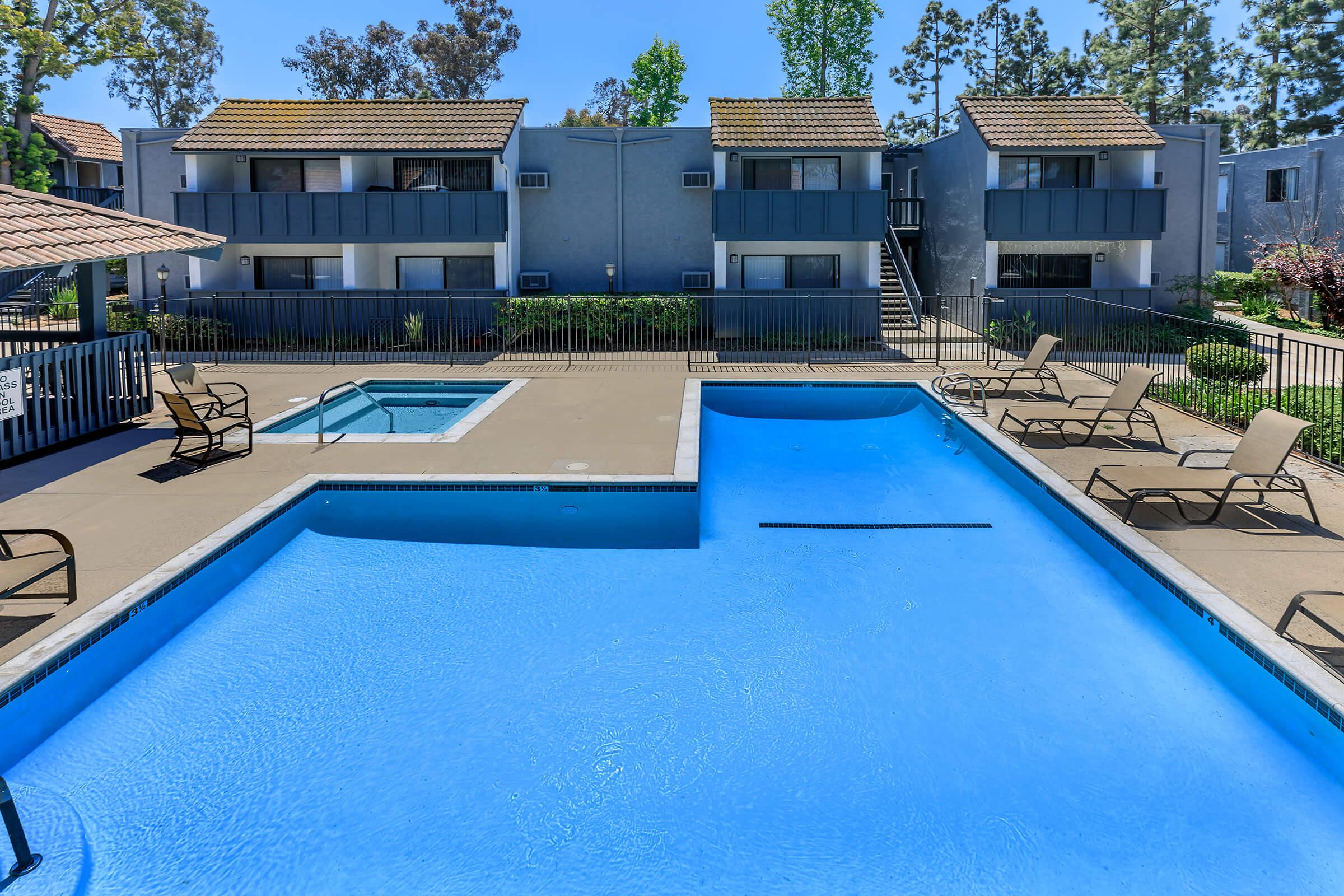 a pool next to a building