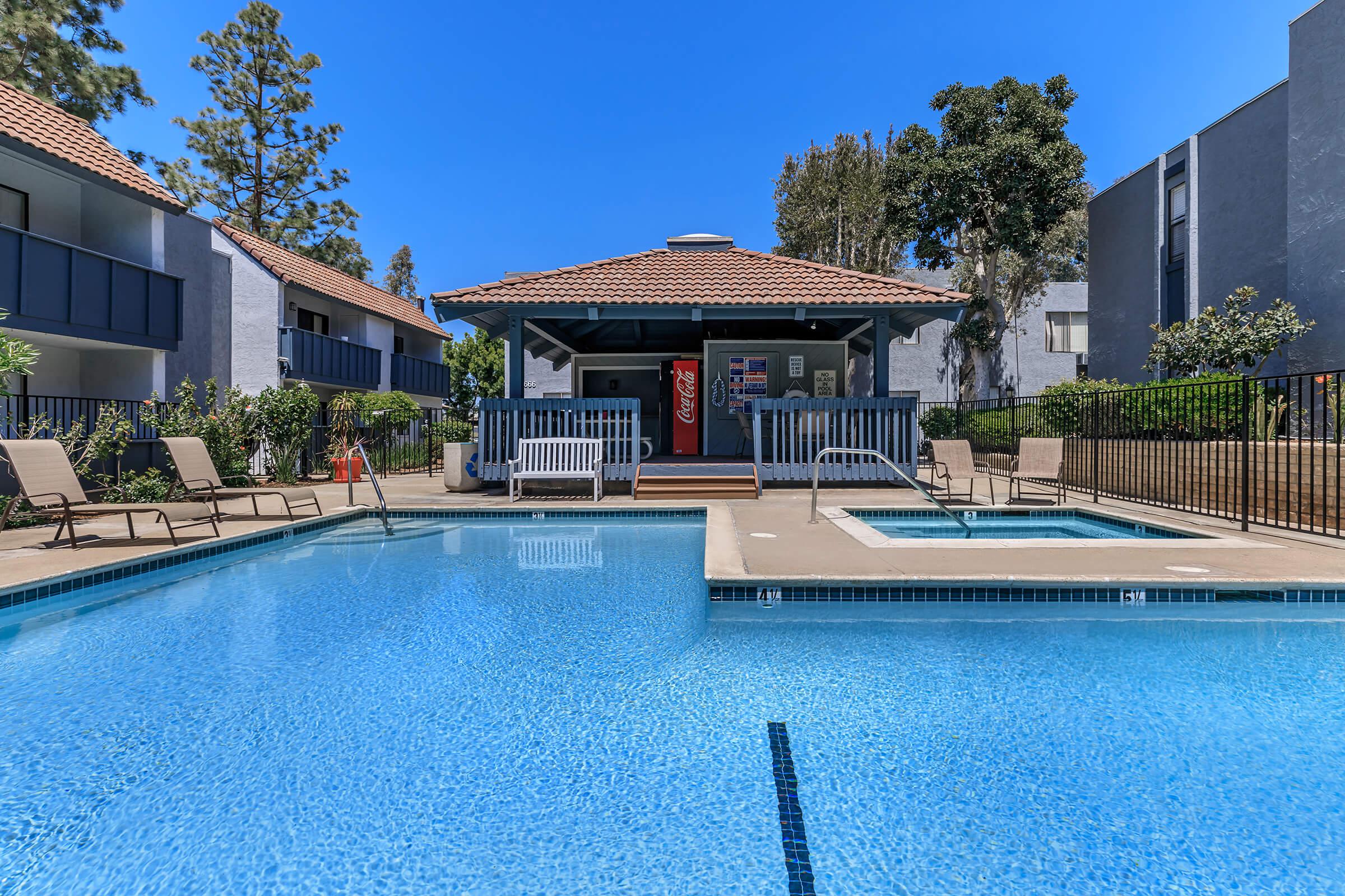 a house with a large pool of water