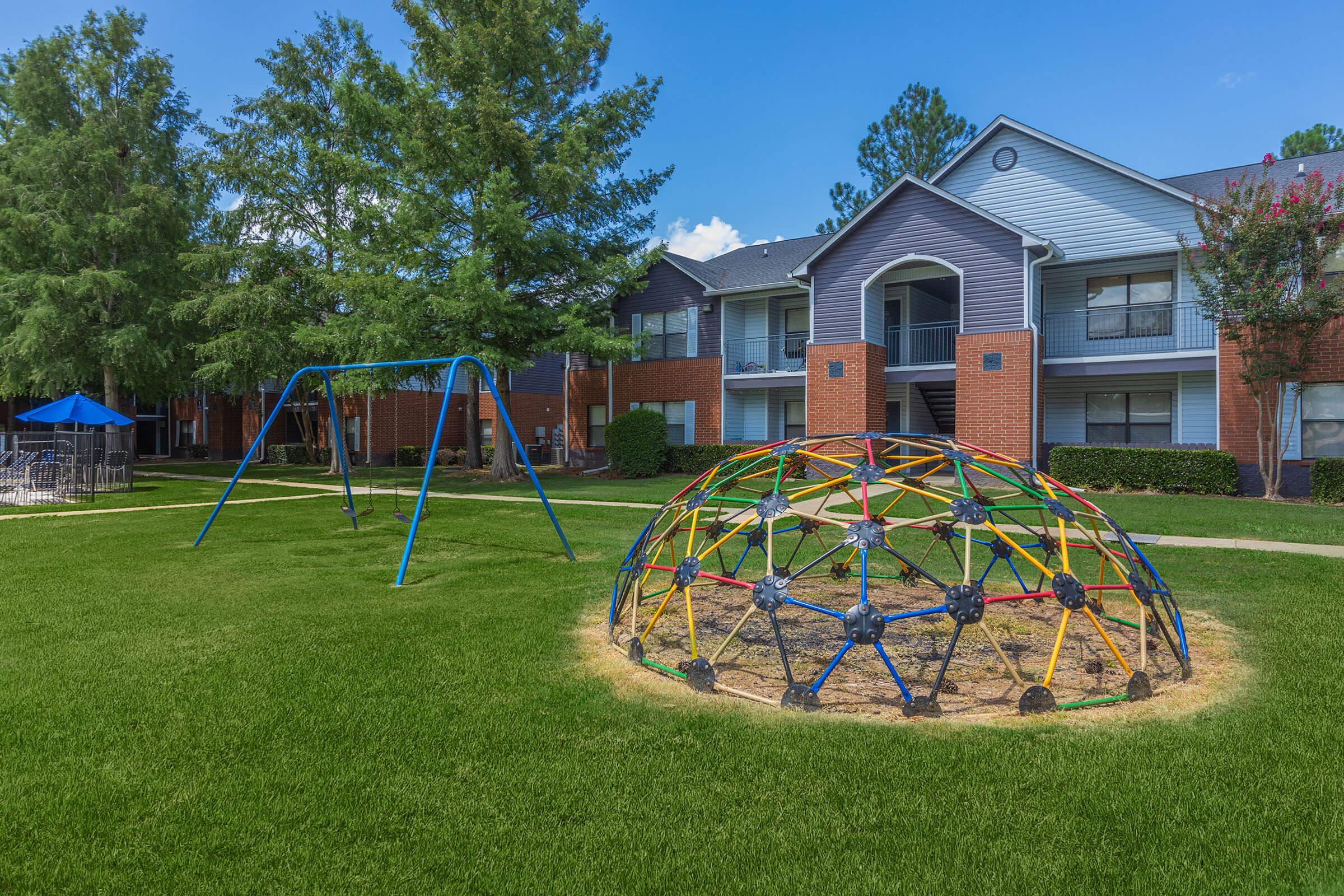 a large lawn in front of a house