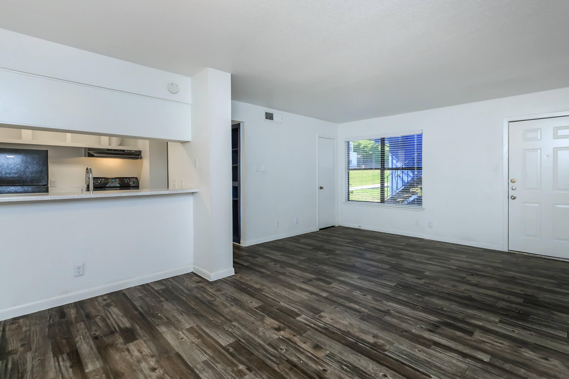 a kitchen with a wood floor