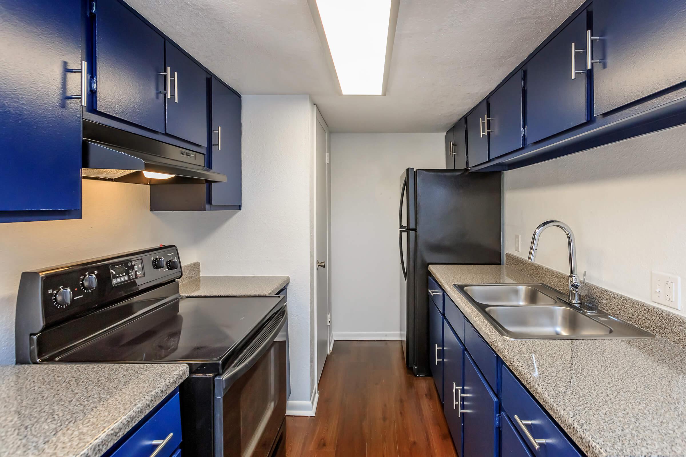 a modern kitchen with stainless steel appliances