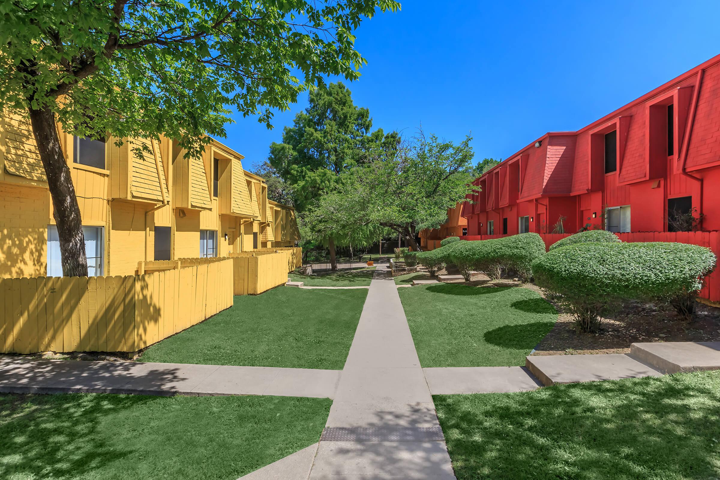 a large lawn in front of a building