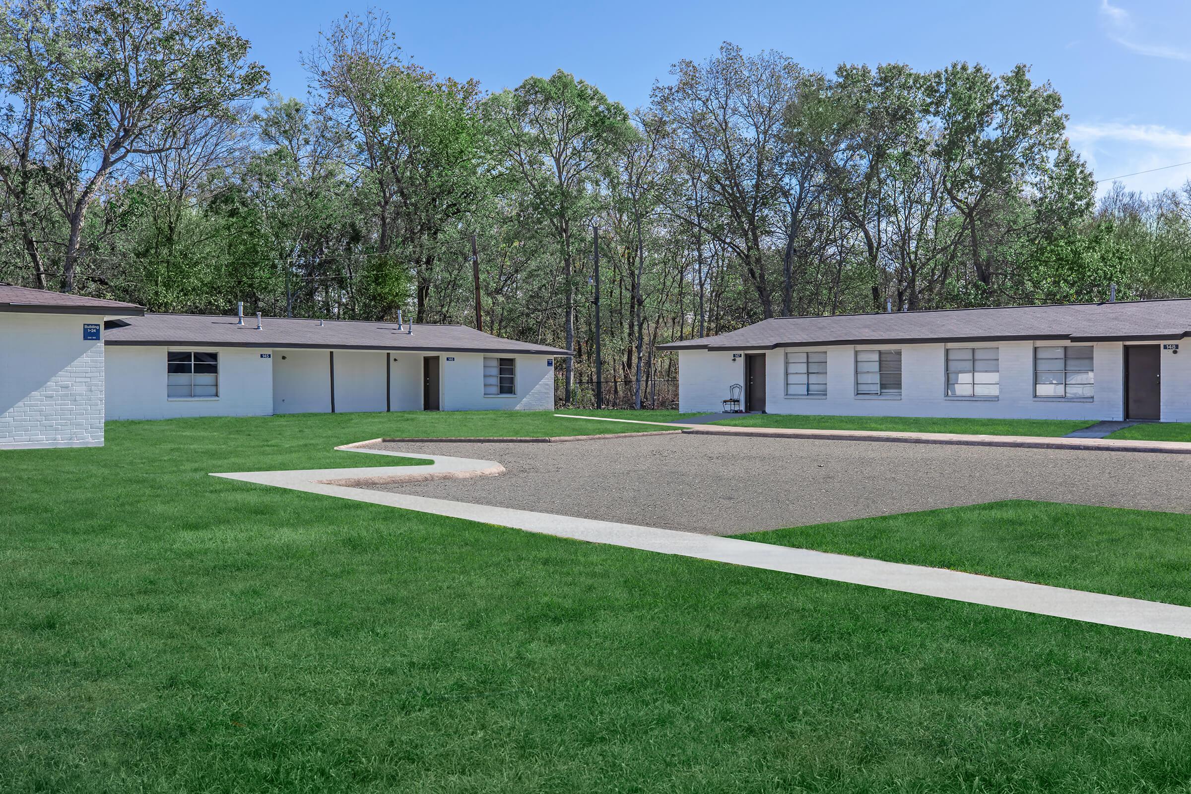 a large lawn in front of a house