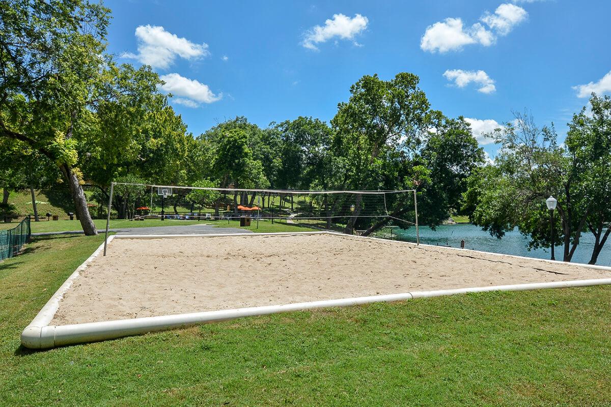 Westshore Colony Apartments in New Braunfels, TX - Sand Volleyball Court 01.jpg