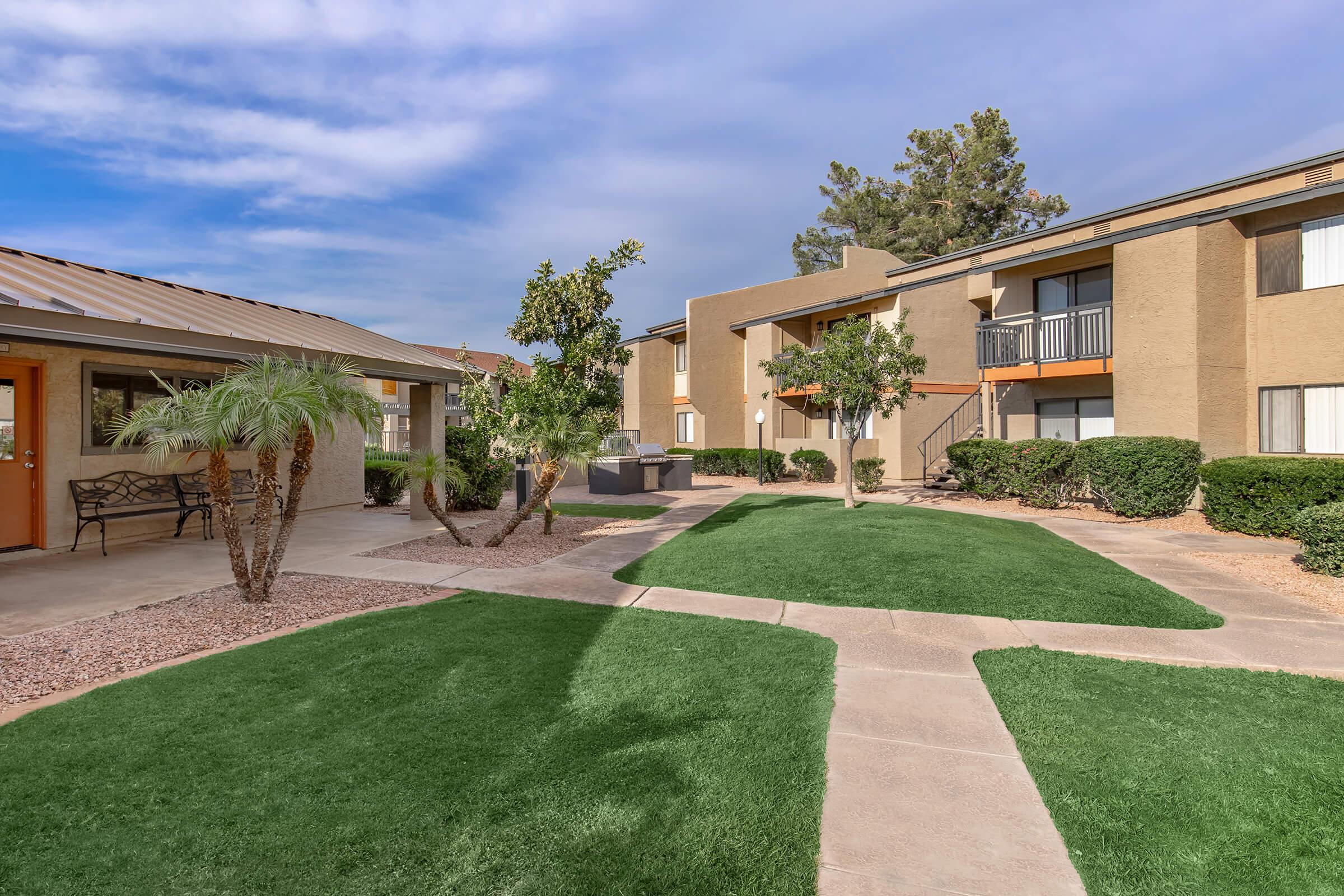 a large lawn in front of a house