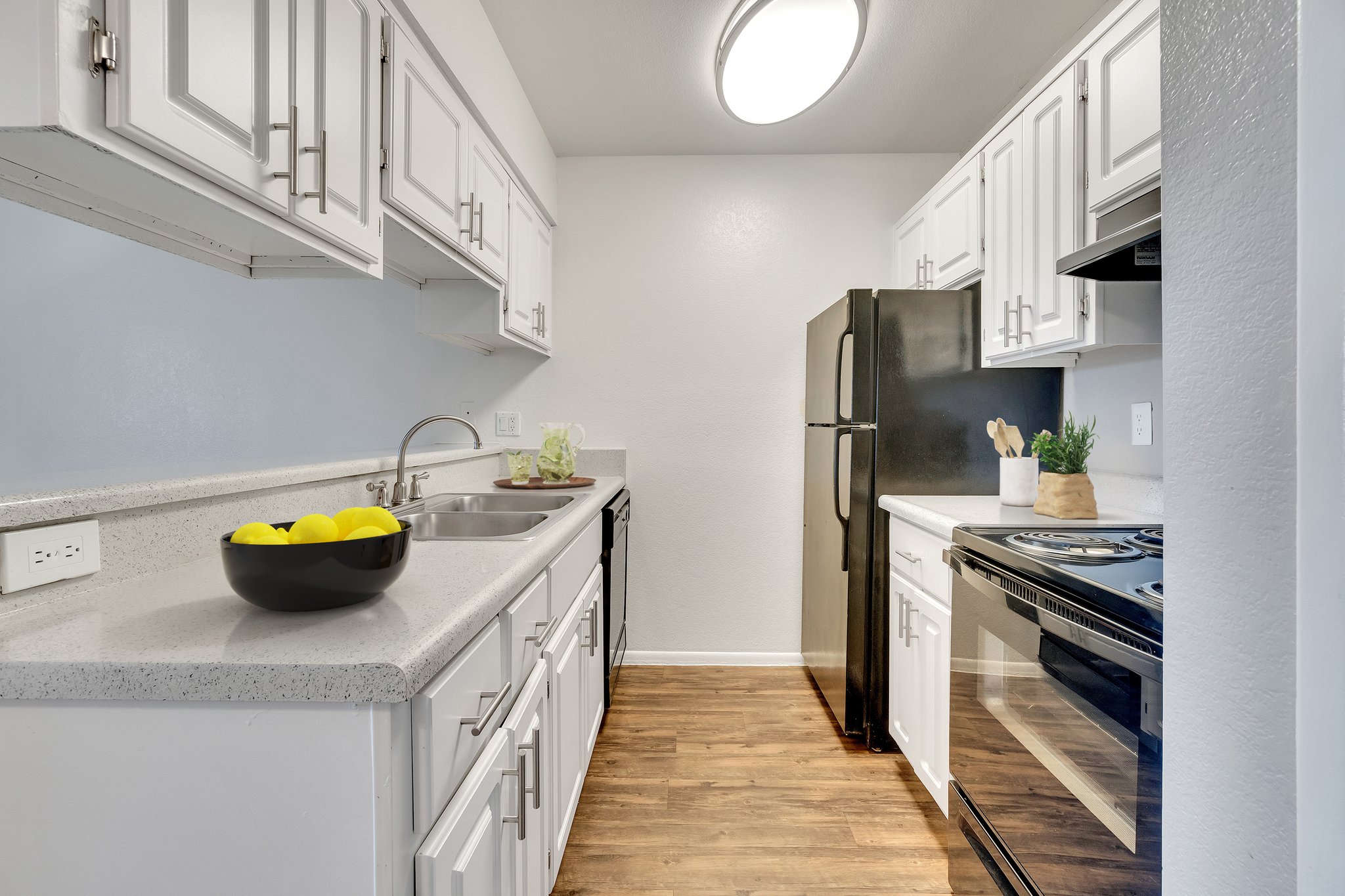 a kitchen with a stove and a sink