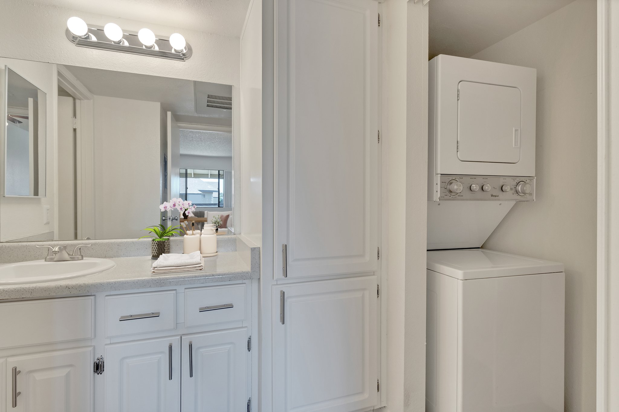 a kitchen with a sink and a window