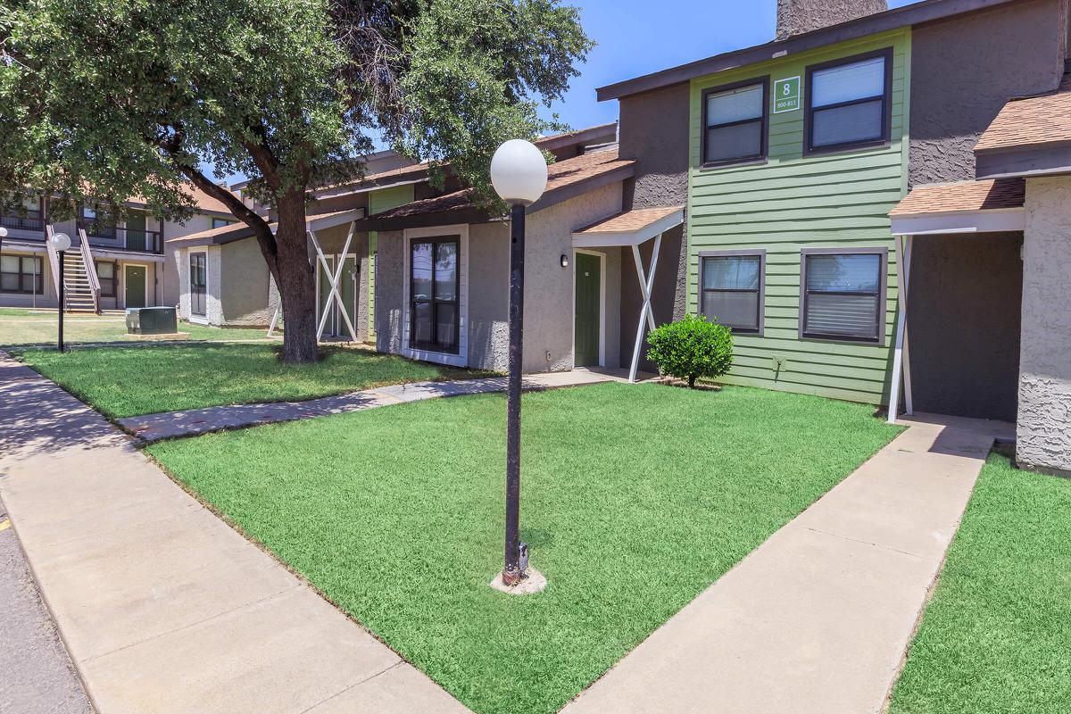 a large lawn in front of a house