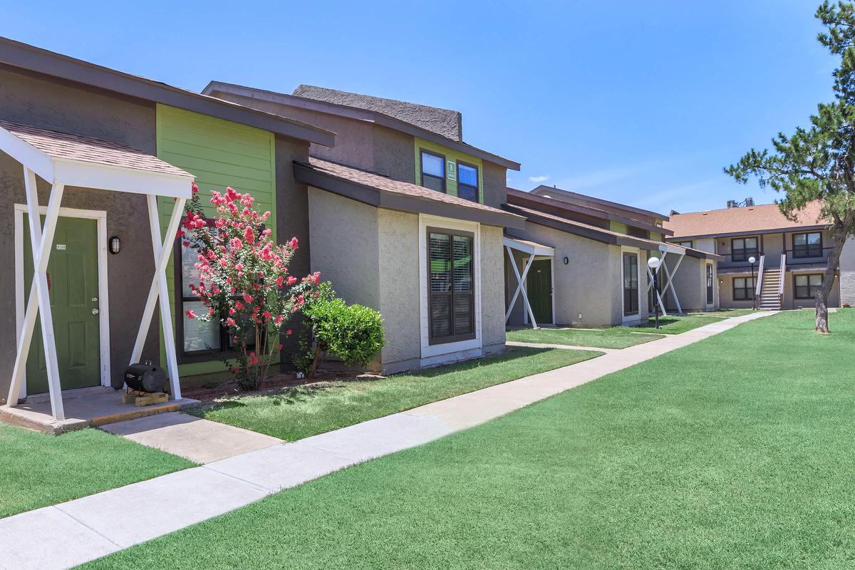 a large lawn in front of a house