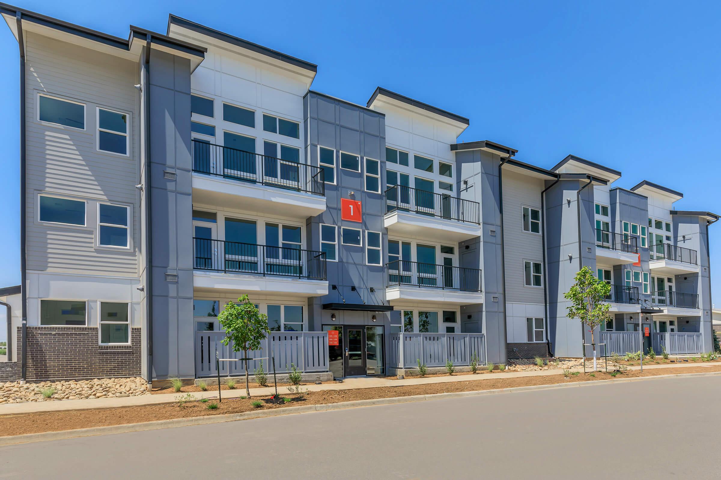 a close up of a street in front of a building