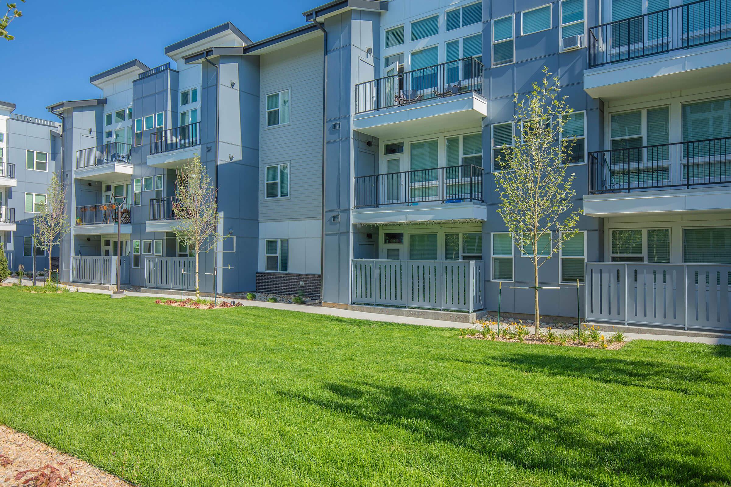 a large lawn in front of a building