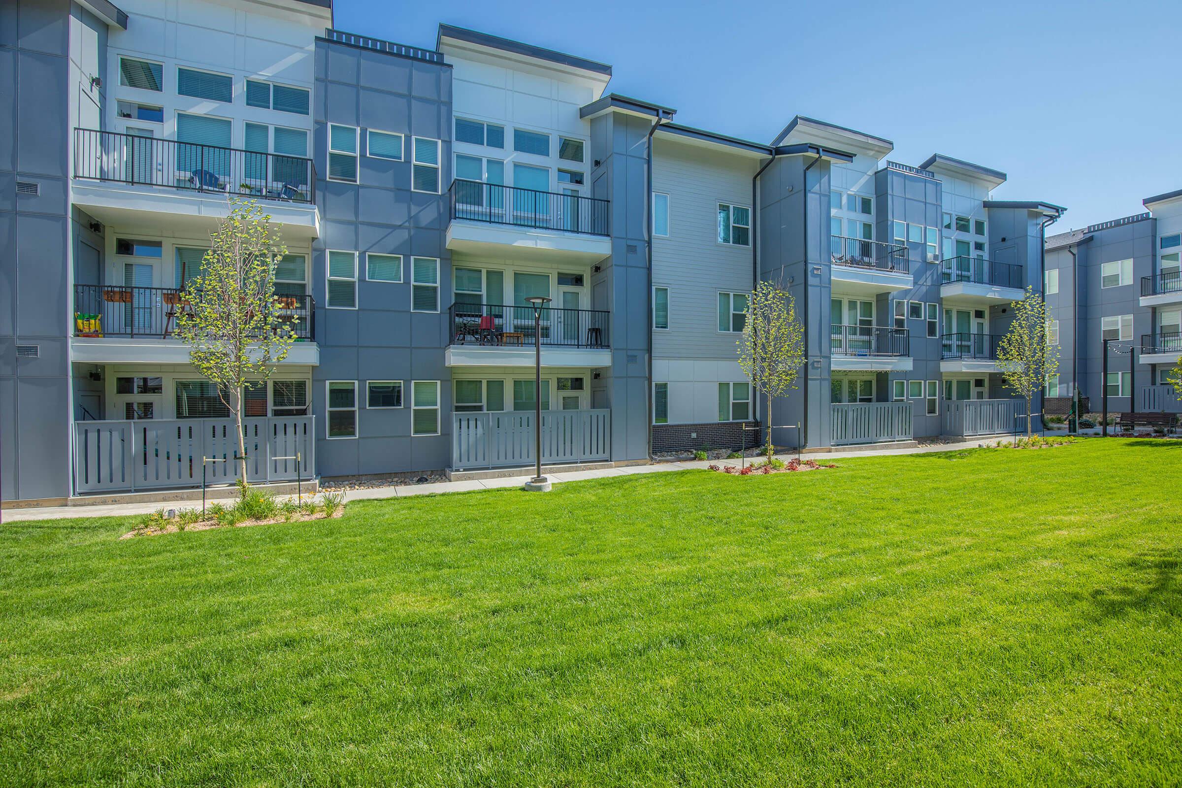 a large lawn in front of a building