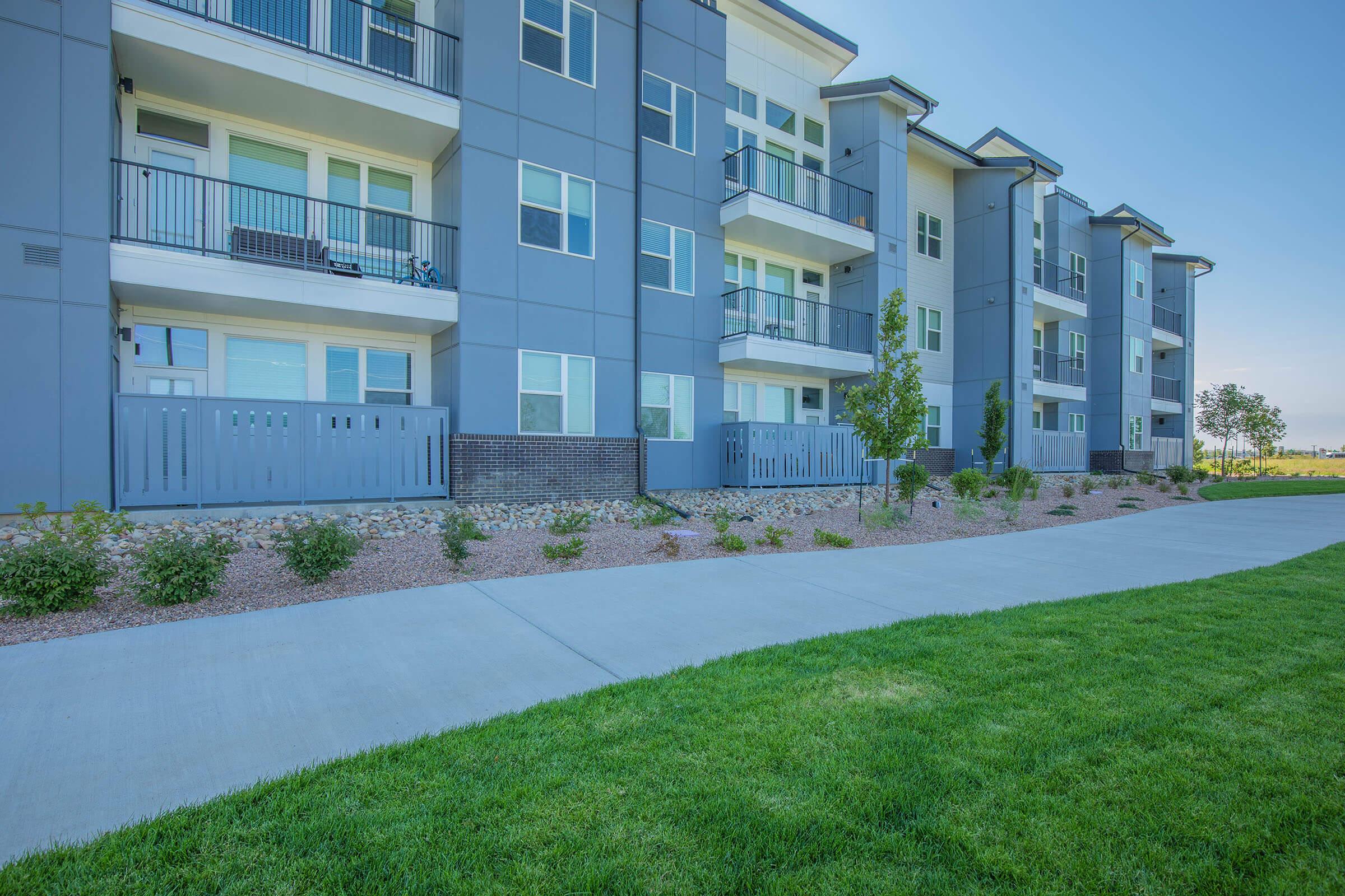 a large lawn in front of a building