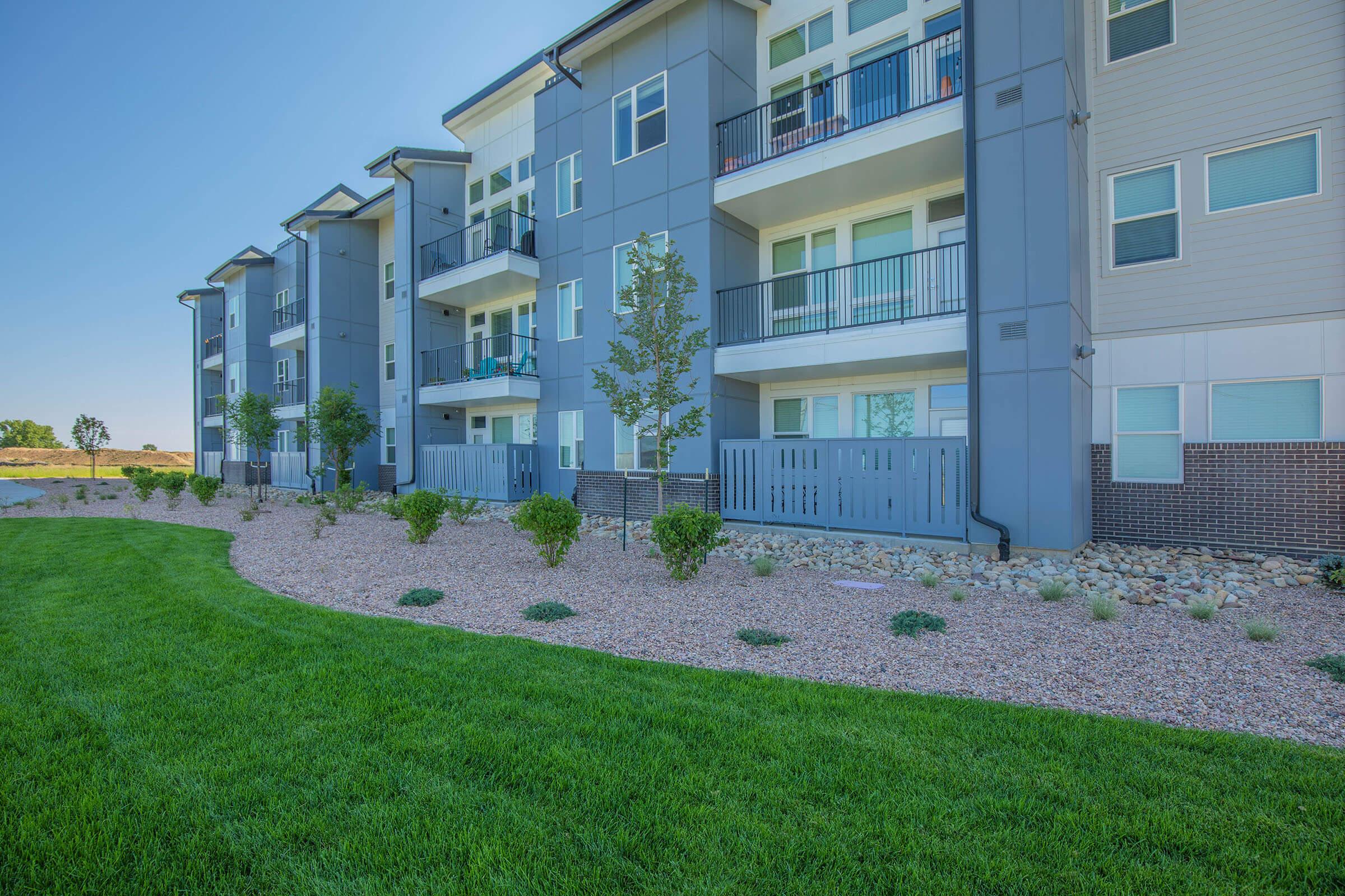 a large lawn in front of a building