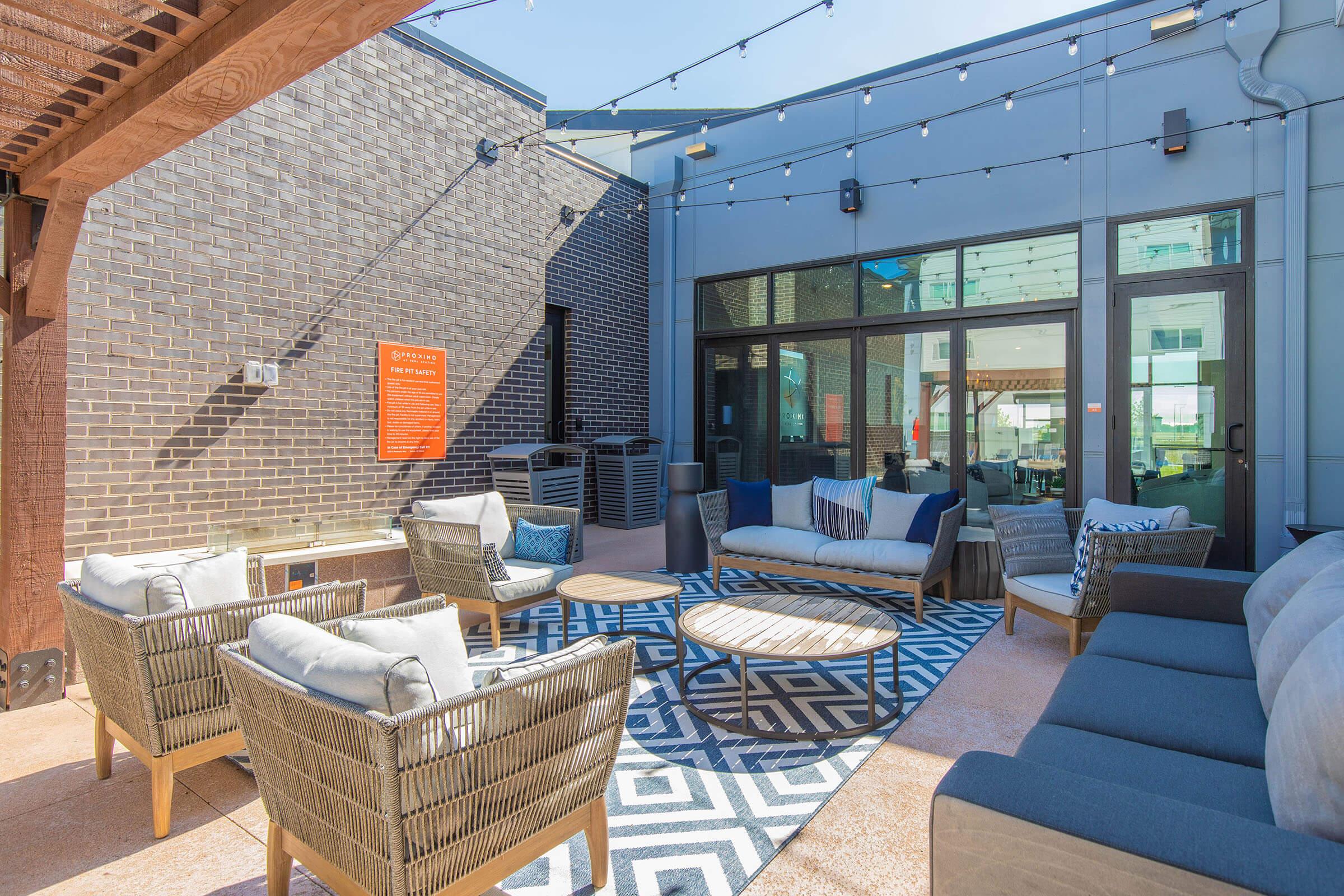 a room filled with furniture and a brick building