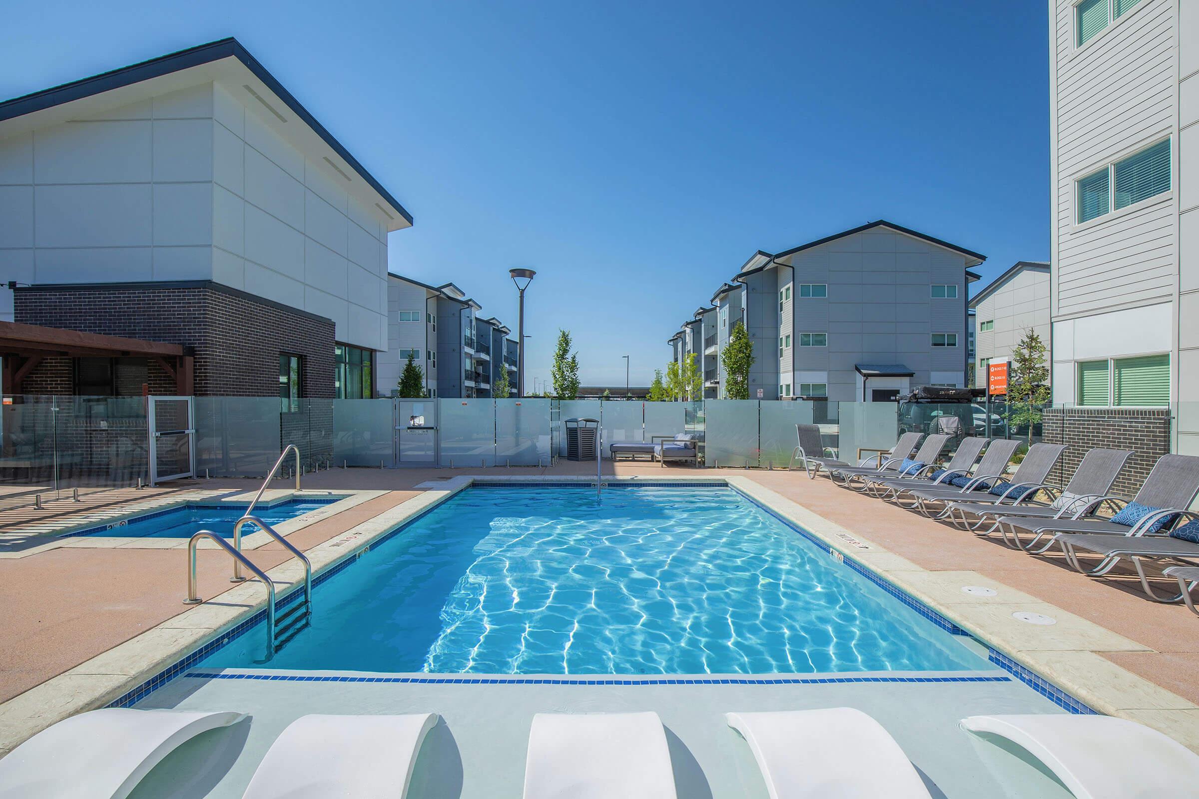 a pool next to a building