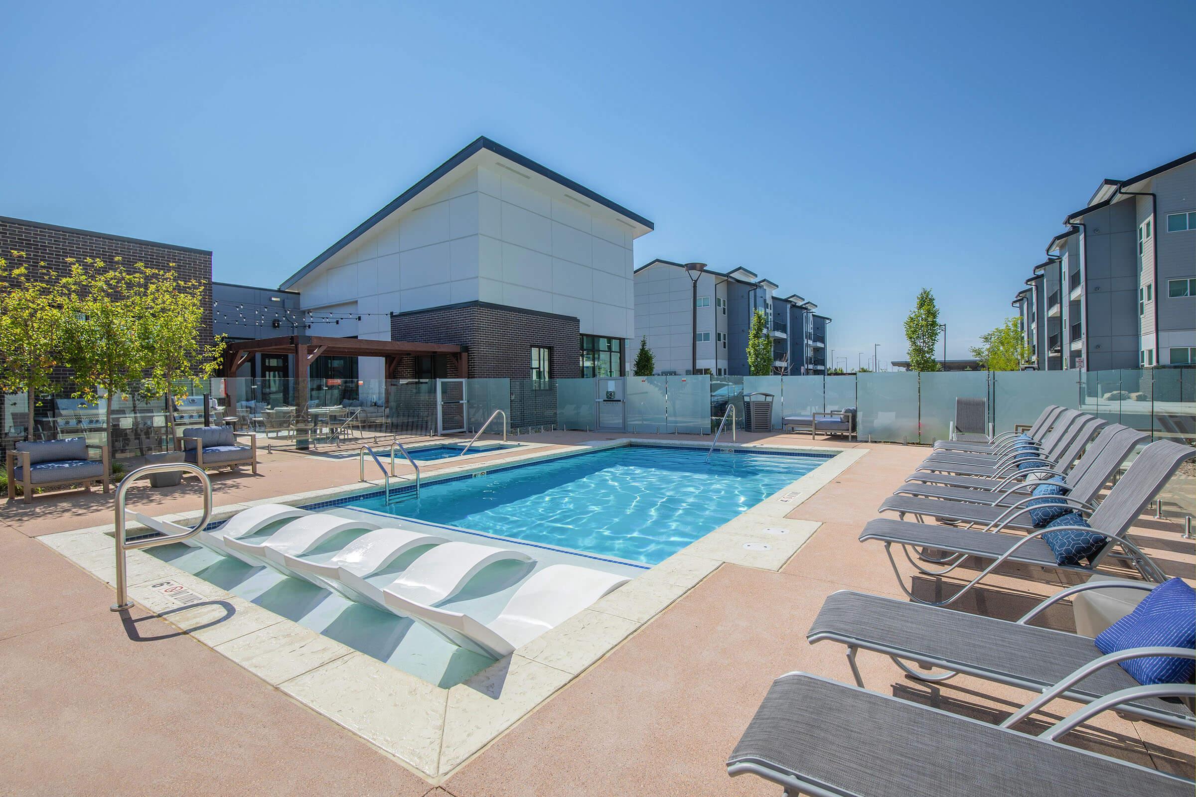 a pool next to a building