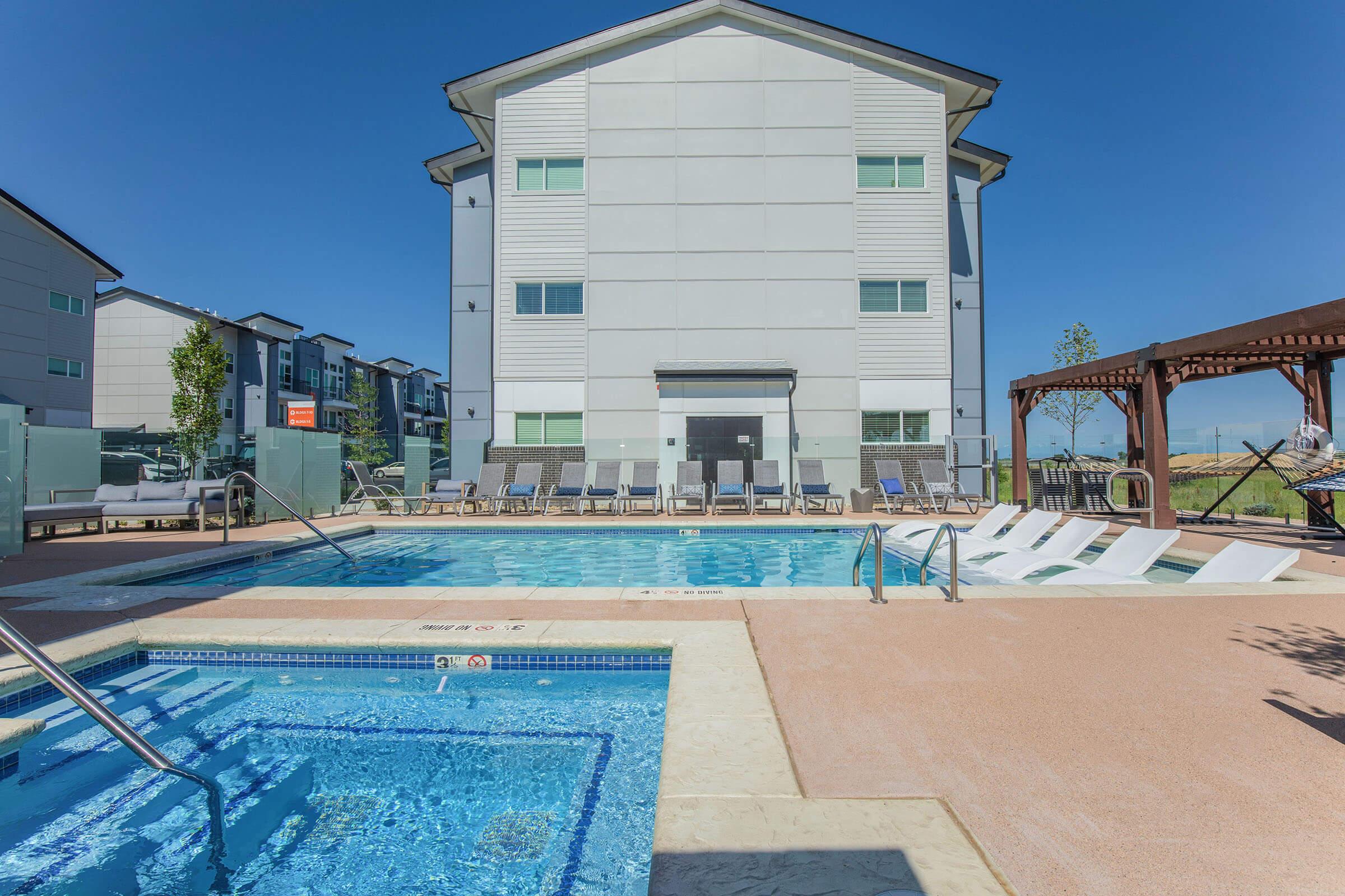 a pool next to a building