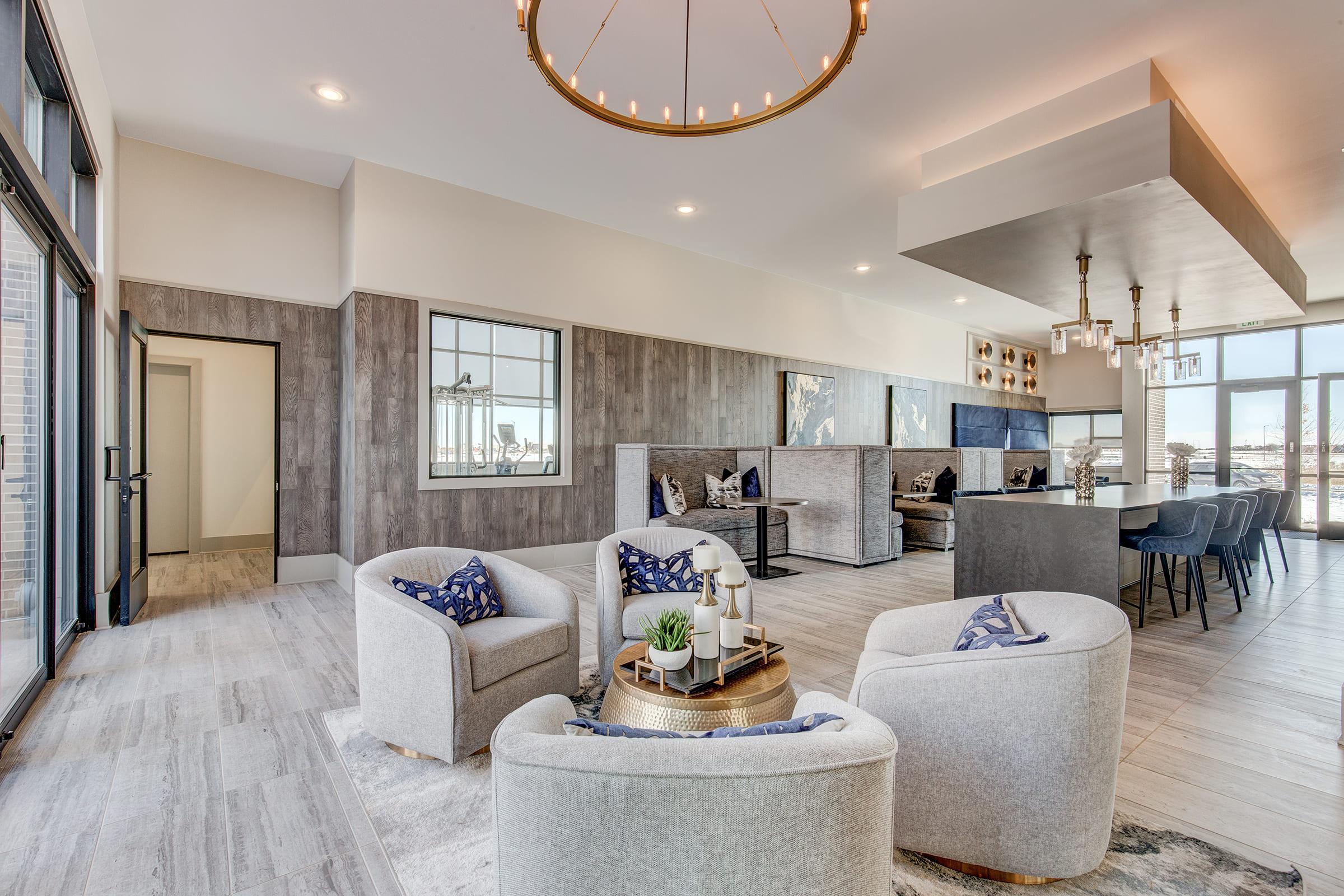 a living room filled with furniture and decor