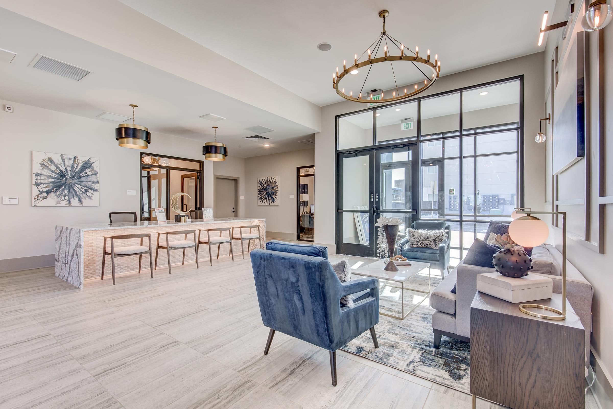 a living room filled with furniture and a fireplace