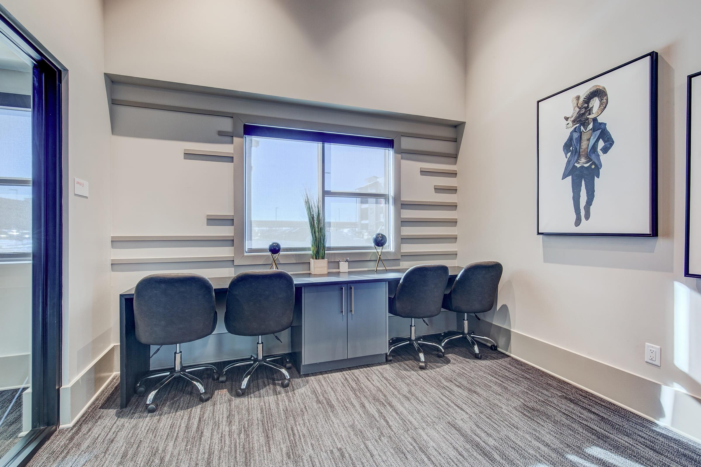 a room filled with furniture and a large window