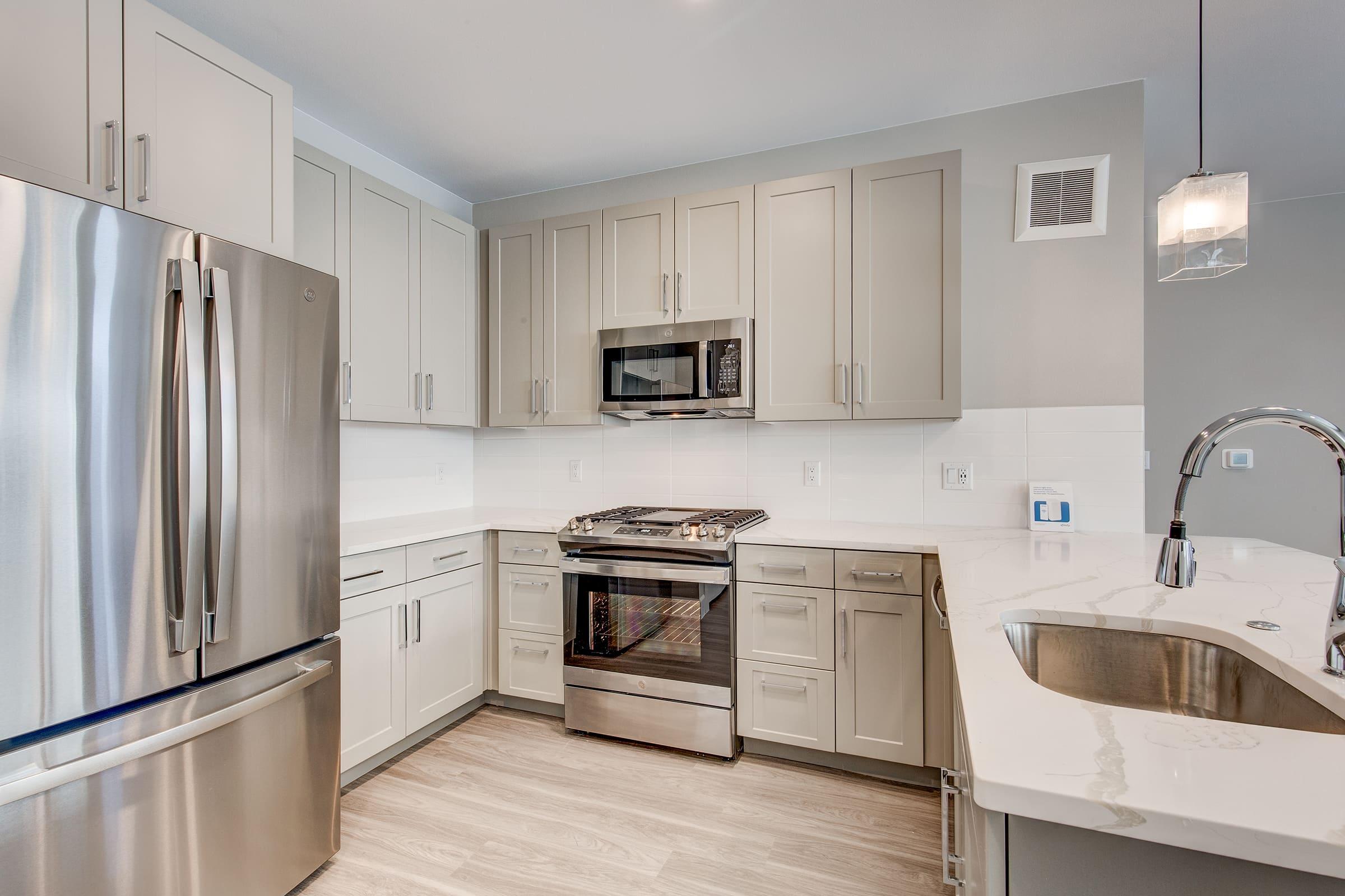 a stainless steel refrigerator in a kitchen