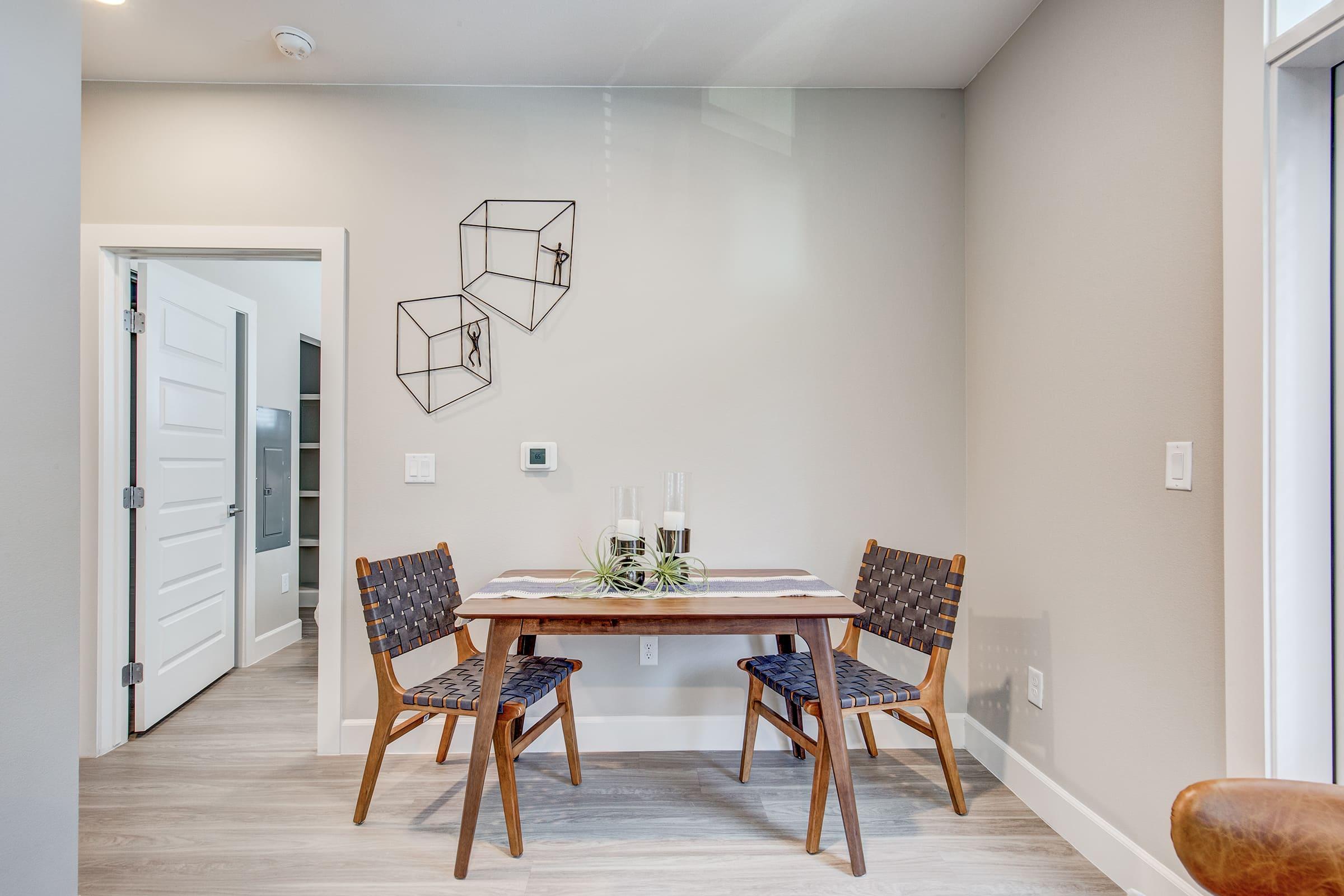 a living room filled with furniture and a large window