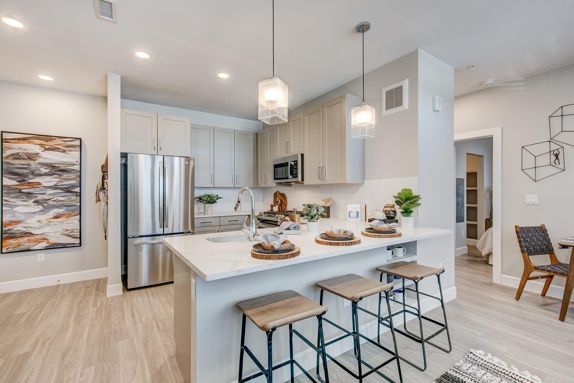 a kitchen with a dining room table